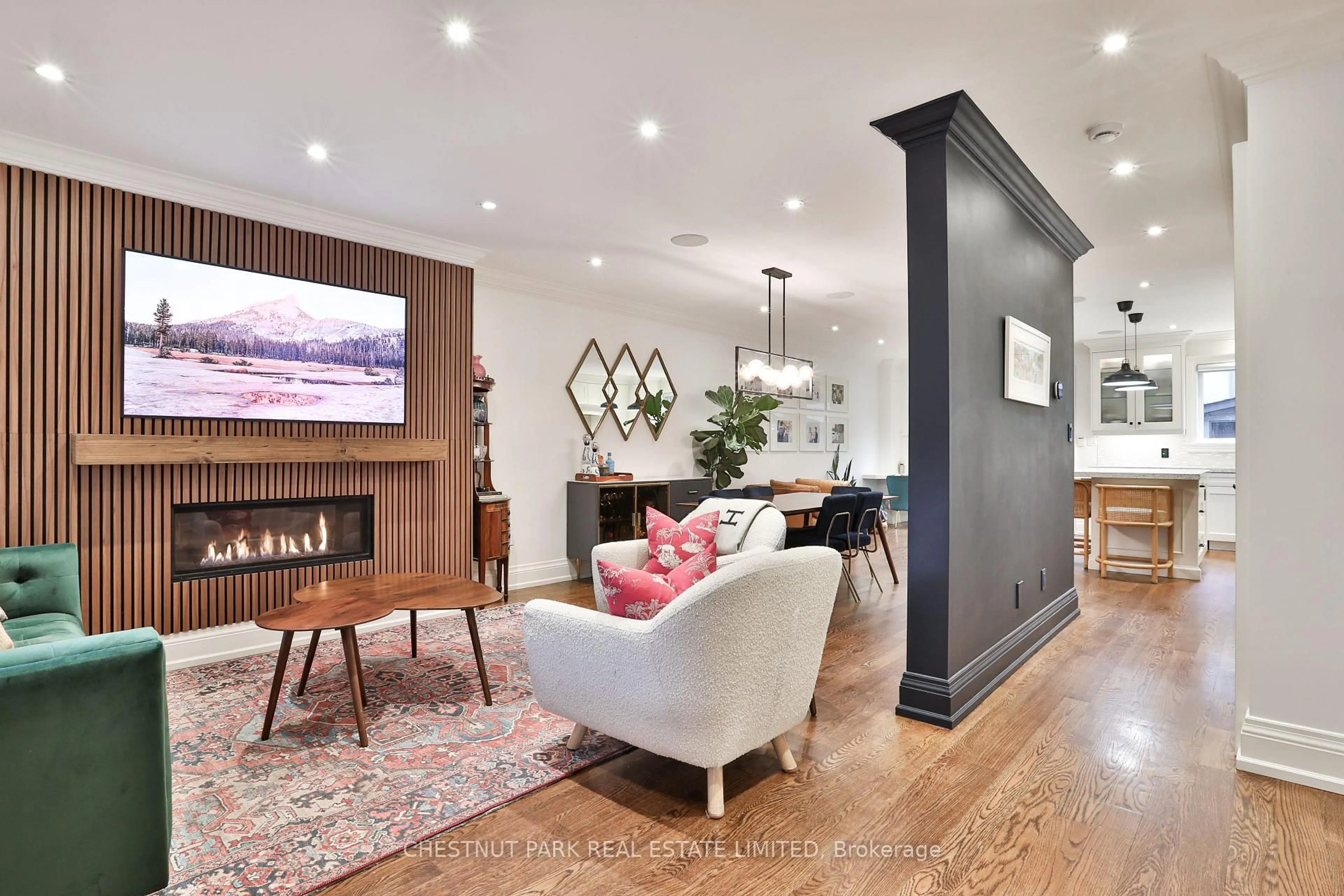 Living room with furniture, wood/laminate floor for 665 Millwood Rd, Toronto Ontario M4S 1L2