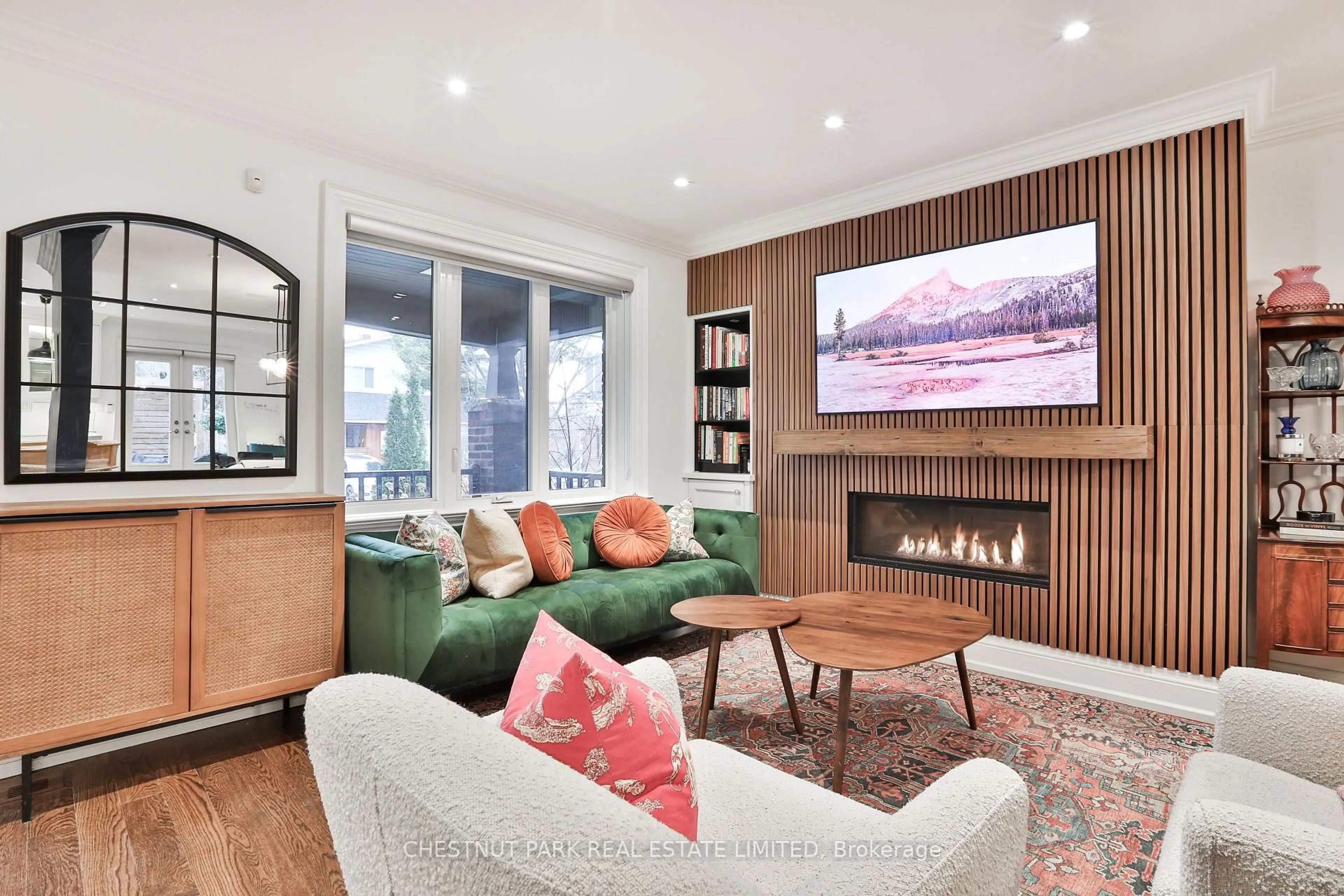 Living room with furniture, wood/laminate floor for 665 Millwood Rd, Toronto Ontario M4S 1L2