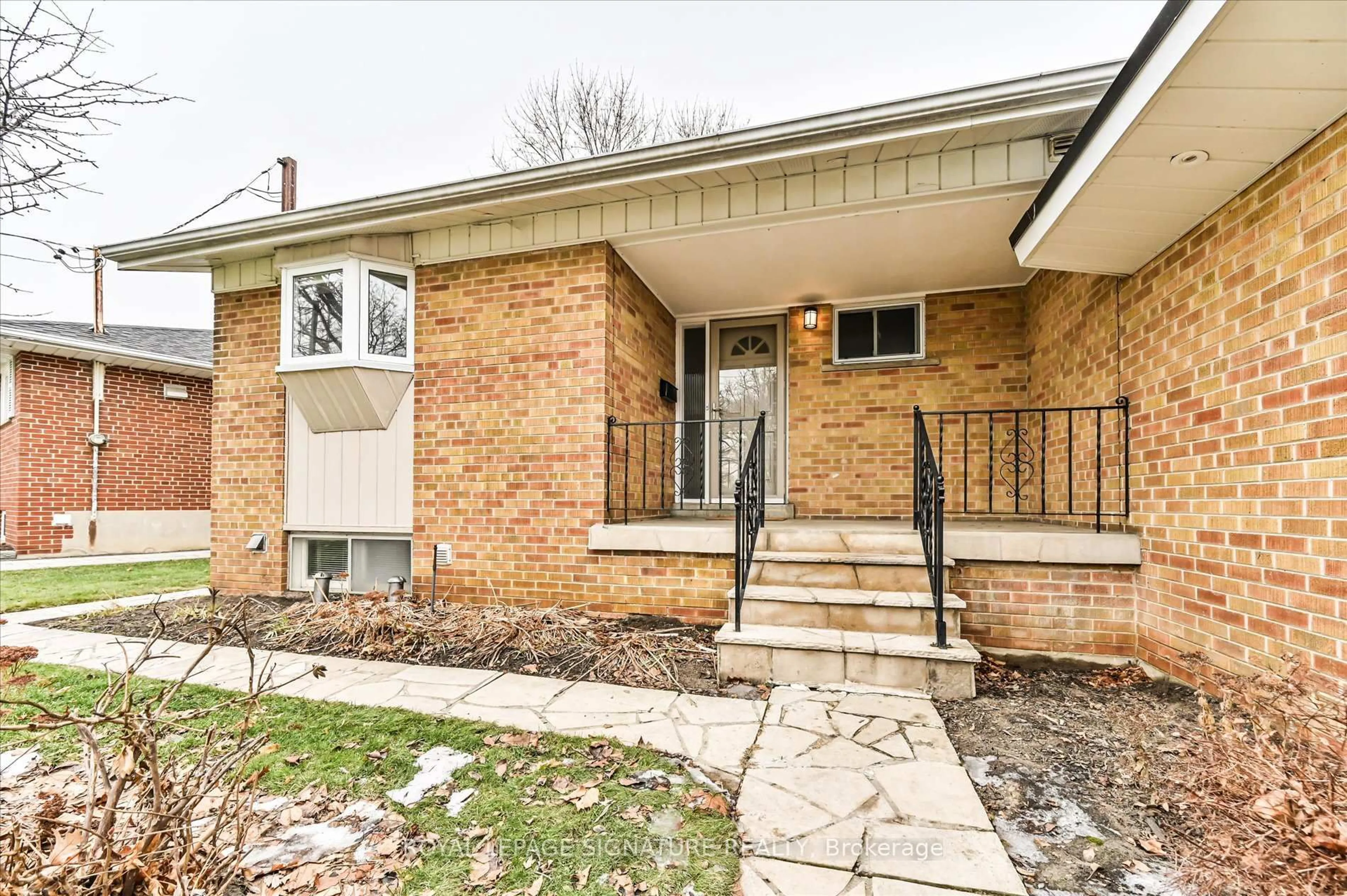 Home with brick exterior material, street for 189 Sloane Ave, Toronto Ontario M4A 2C5