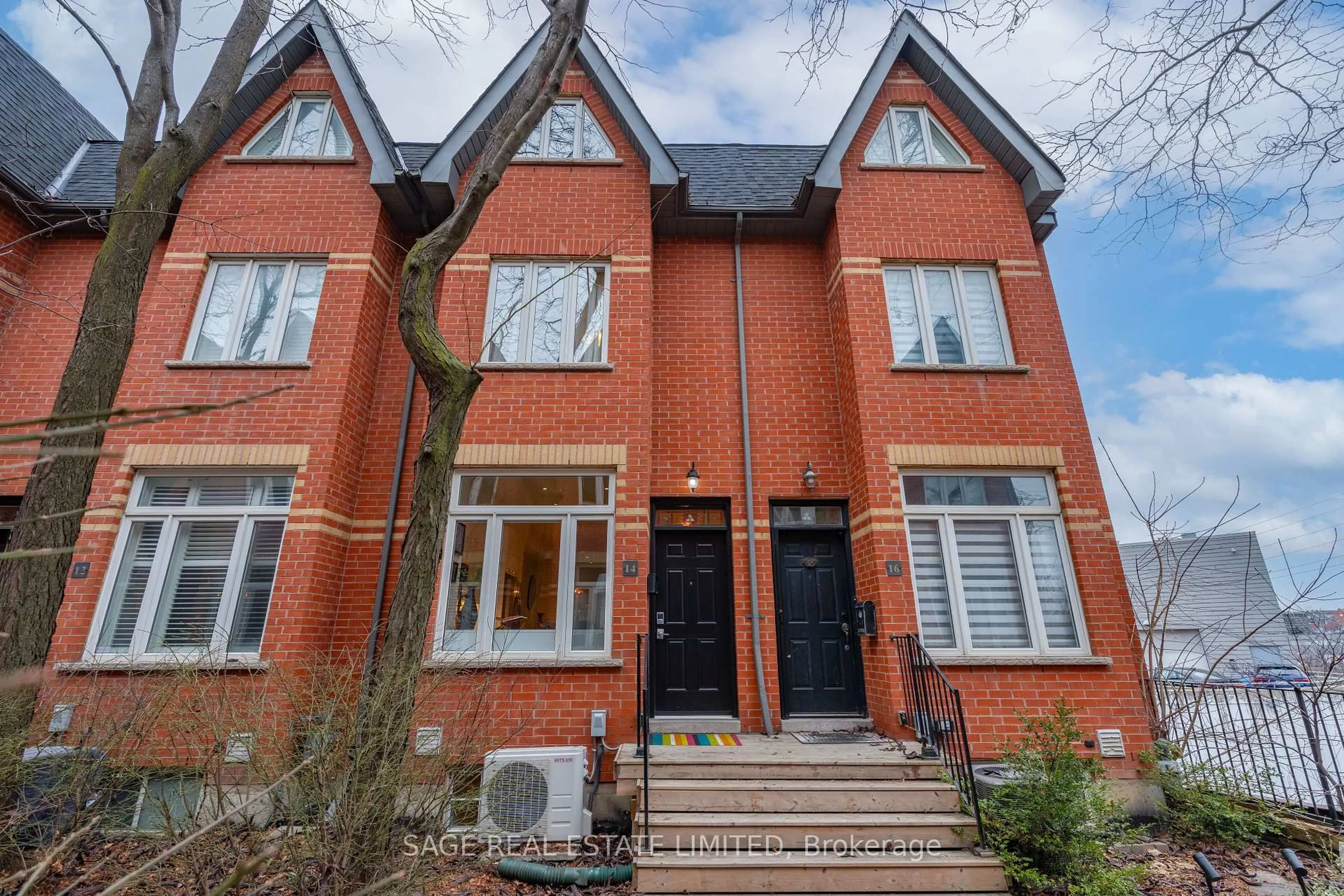 Home with brick exterior material, street for 14 Old Trillium Lane, Toronto Ontario M5A 4T2