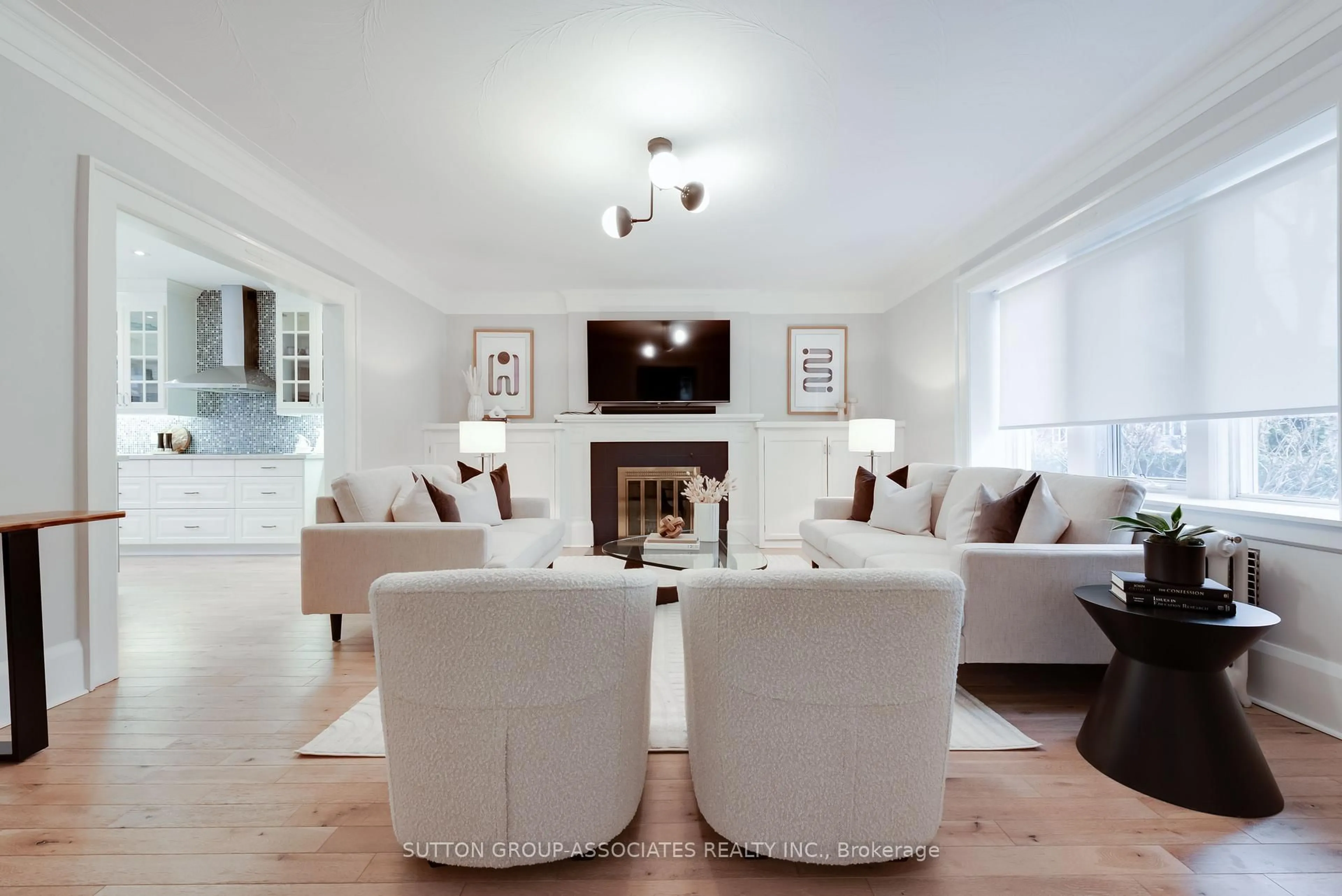 Living room with furniture, wood/laminate floor for 91 Northcliffe Blvd, Toronto Ontario M6H 3H3