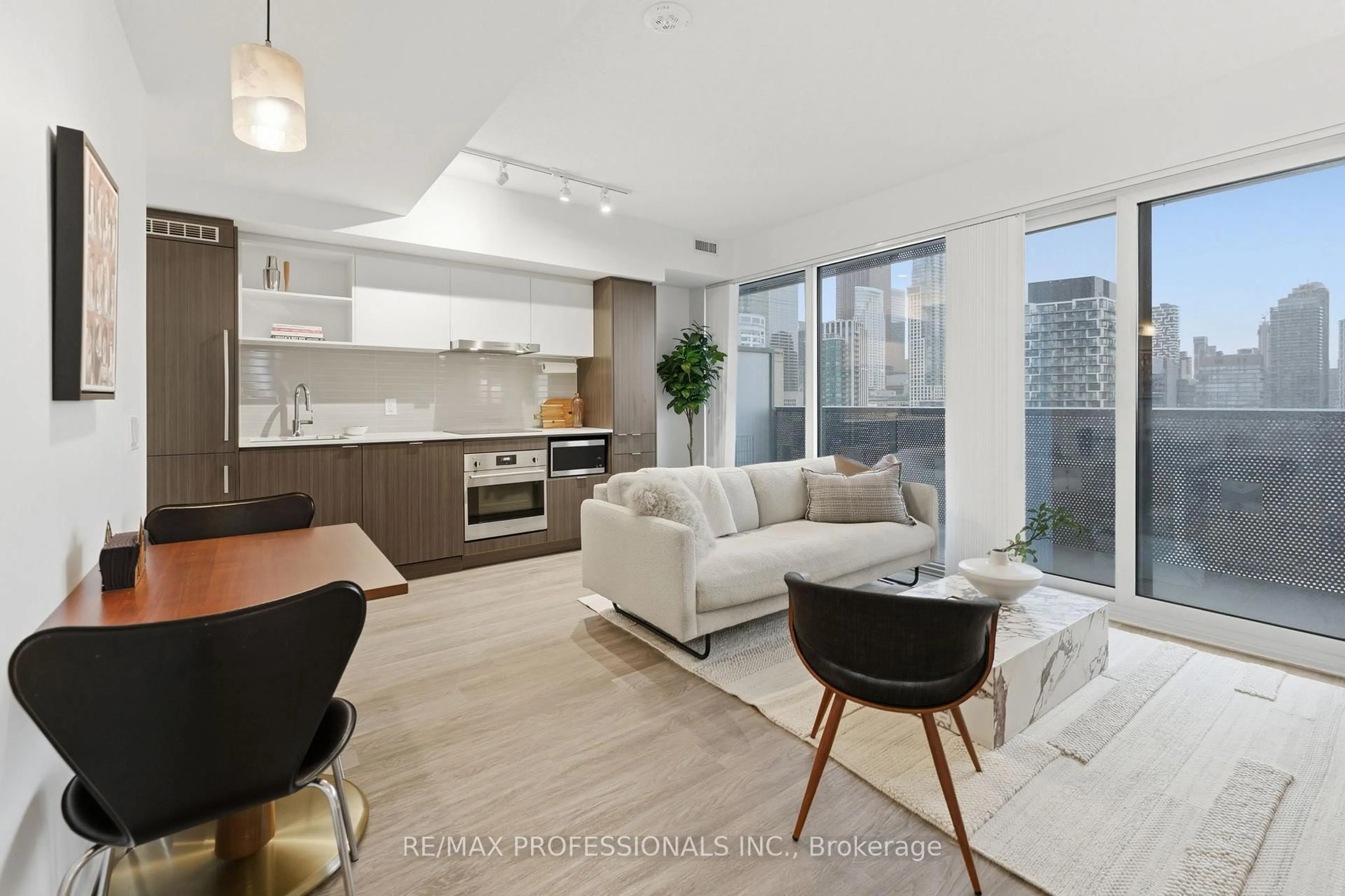 Living room with furniture, unknown for 55 Cooper St #2005, Toronto Ontario M5E 0G1