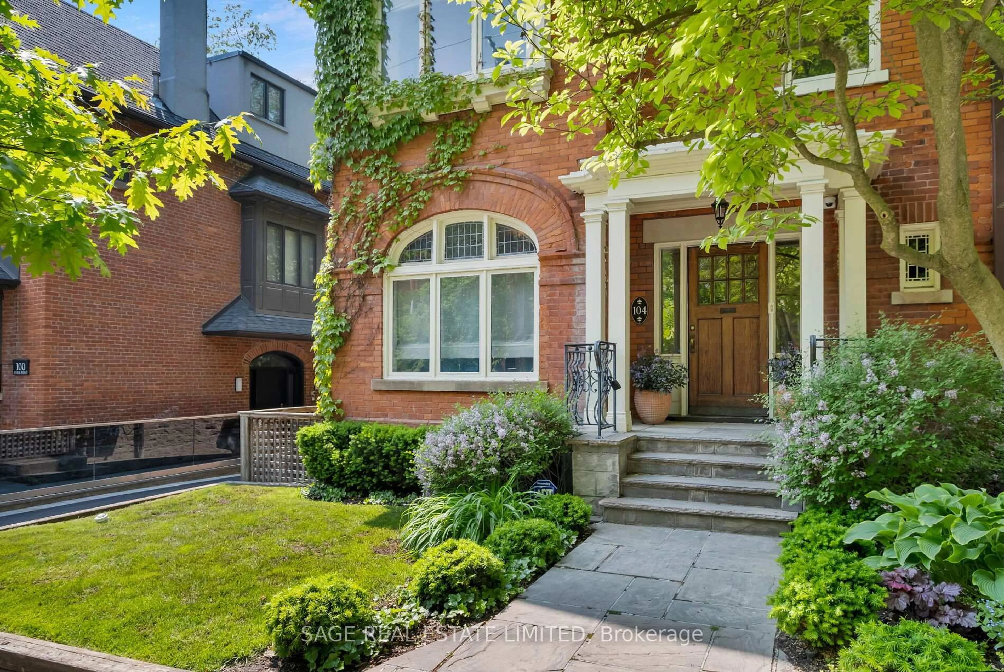 Home with brick exterior material, street for 104 Park Rd, Toronto Ontario M4W 2N7