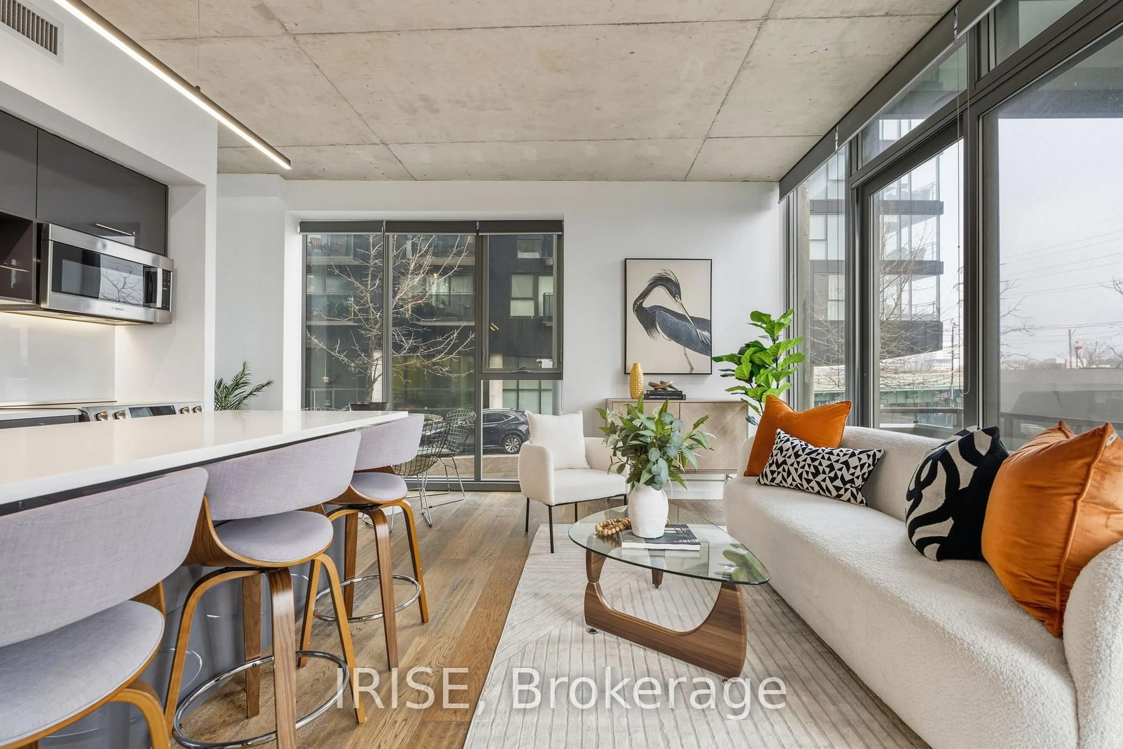 Living room with furniture, unknown for 32 Trolley Cres #201, Toronto Ontario M5A 0H4