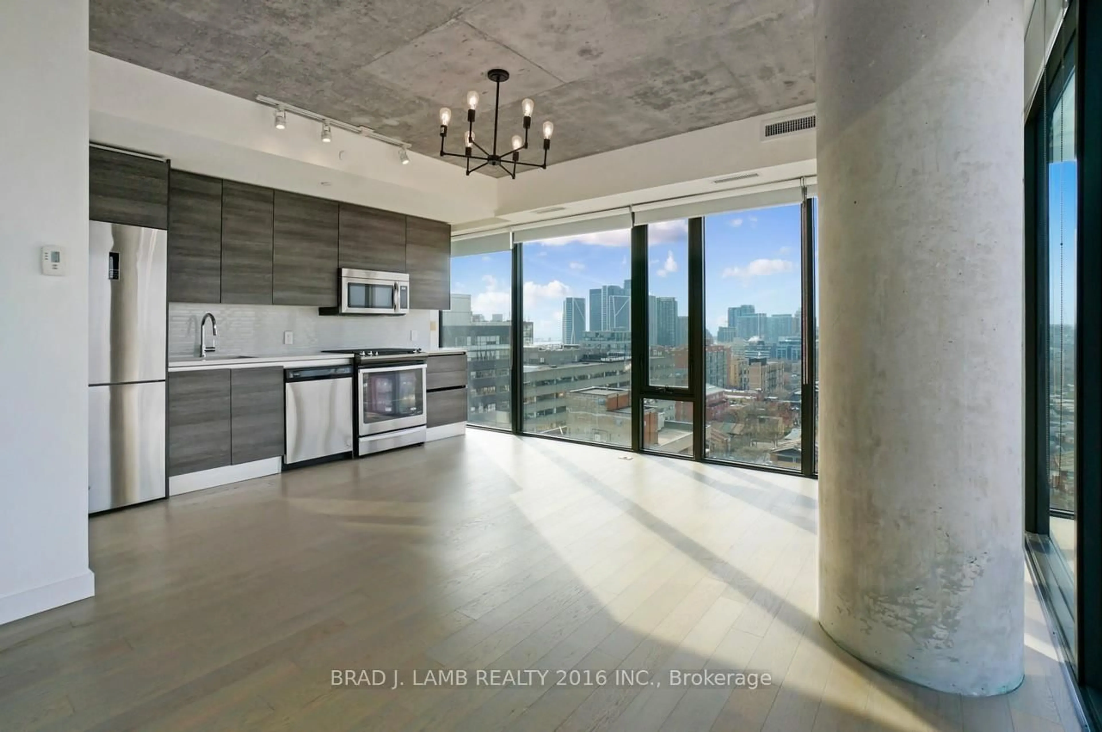 Open concept kitchen, cement floor for 111 Bathurst St #1609, Toronto Ontario M5V 1N6