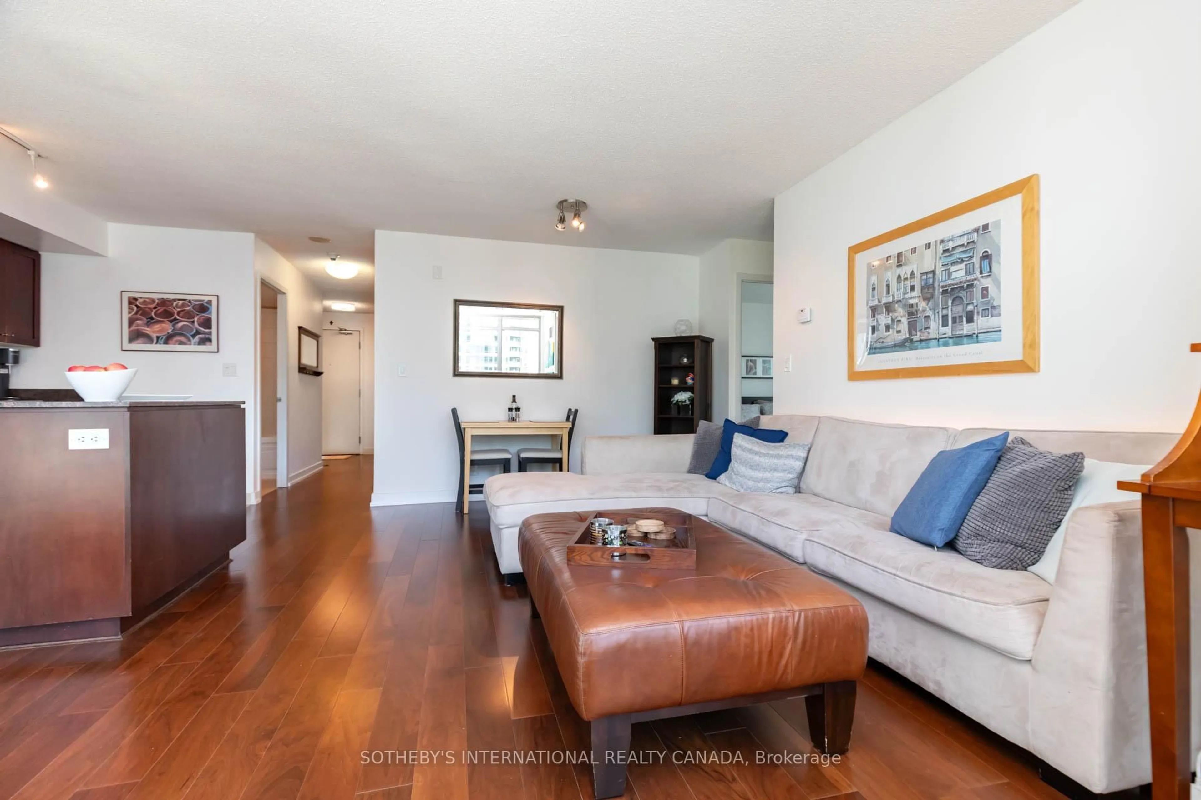 Living room with furniture, wood/laminate floor for 81 Navy Wharf Crt #2310, Toronto Ontario M5V 3S2