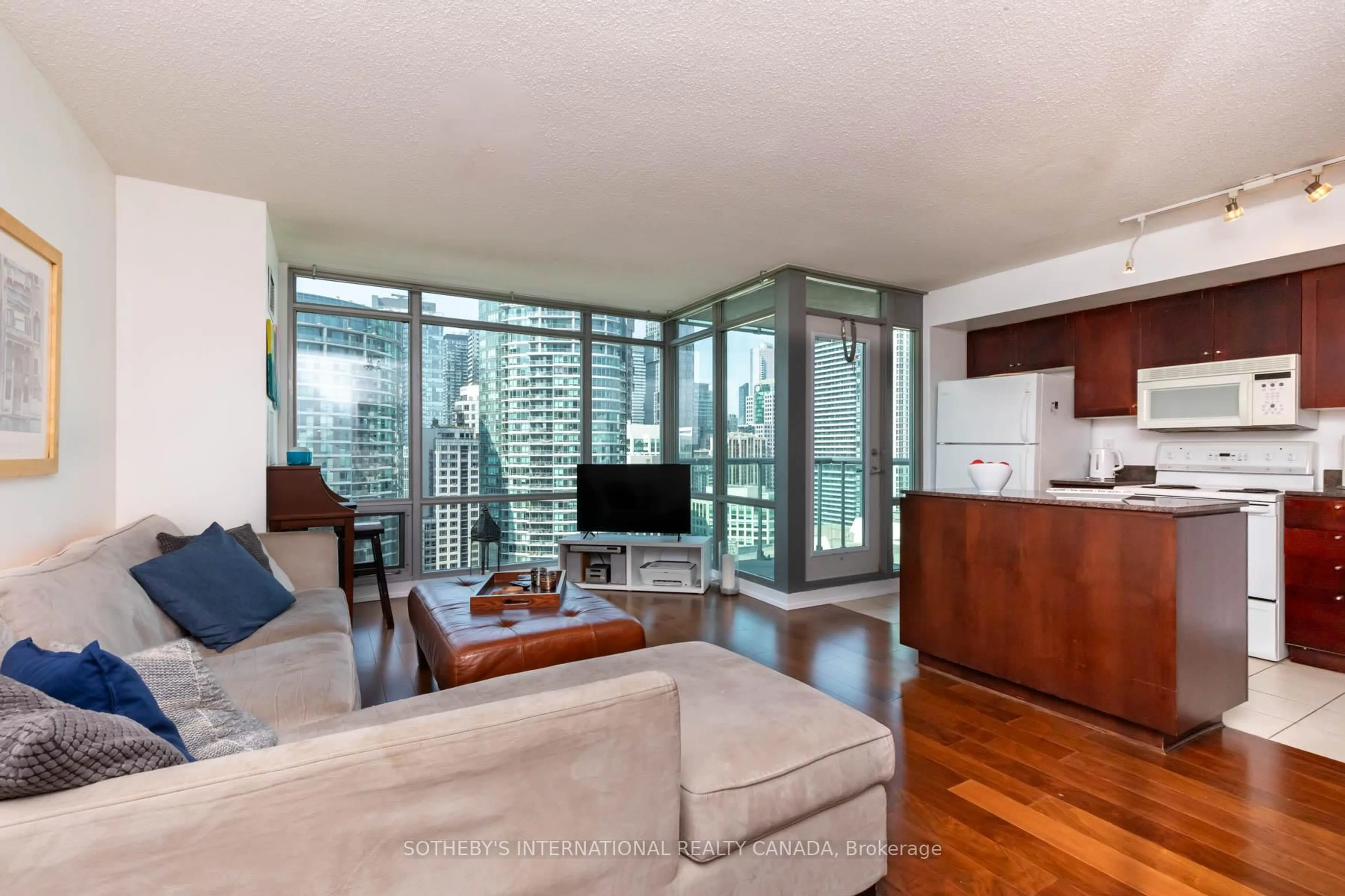 Living room with furniture, unknown for 81 Navy Wharf Crt #2310, Toronto Ontario M5V 3S2