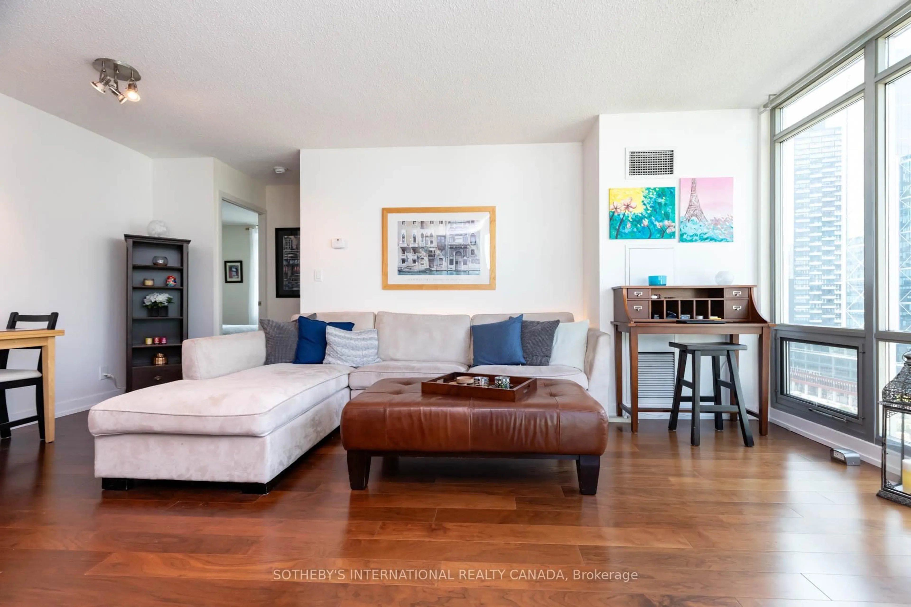 Living room with furniture, wood/laminate floor for 81 Navy Wharf Crt #2310, Toronto Ontario M5V 3S2