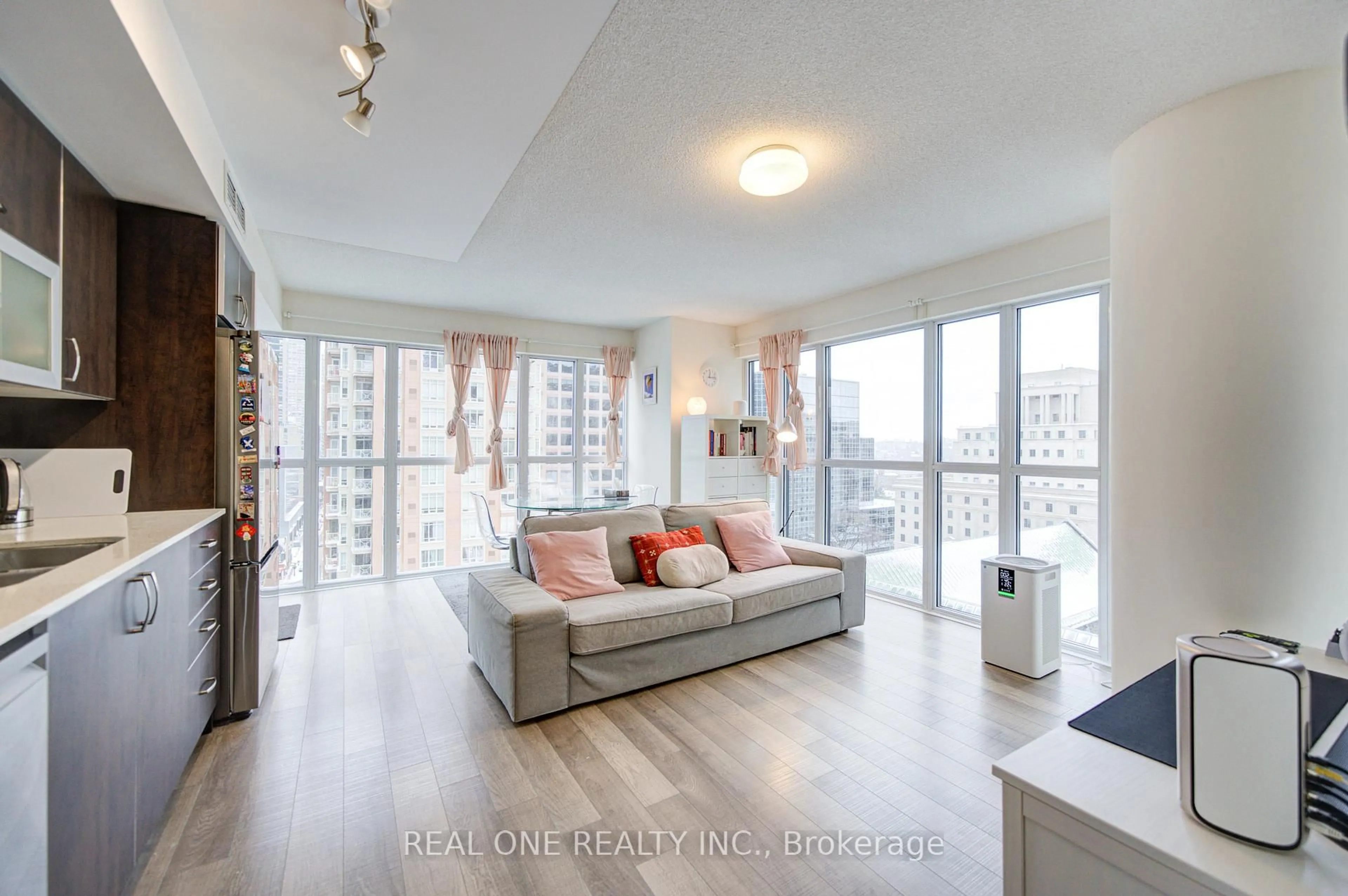 Living room with furniture, wood/laminate floor for 28 Ted Rogers Way #1509, Toronto Ontario M4Y 2J4