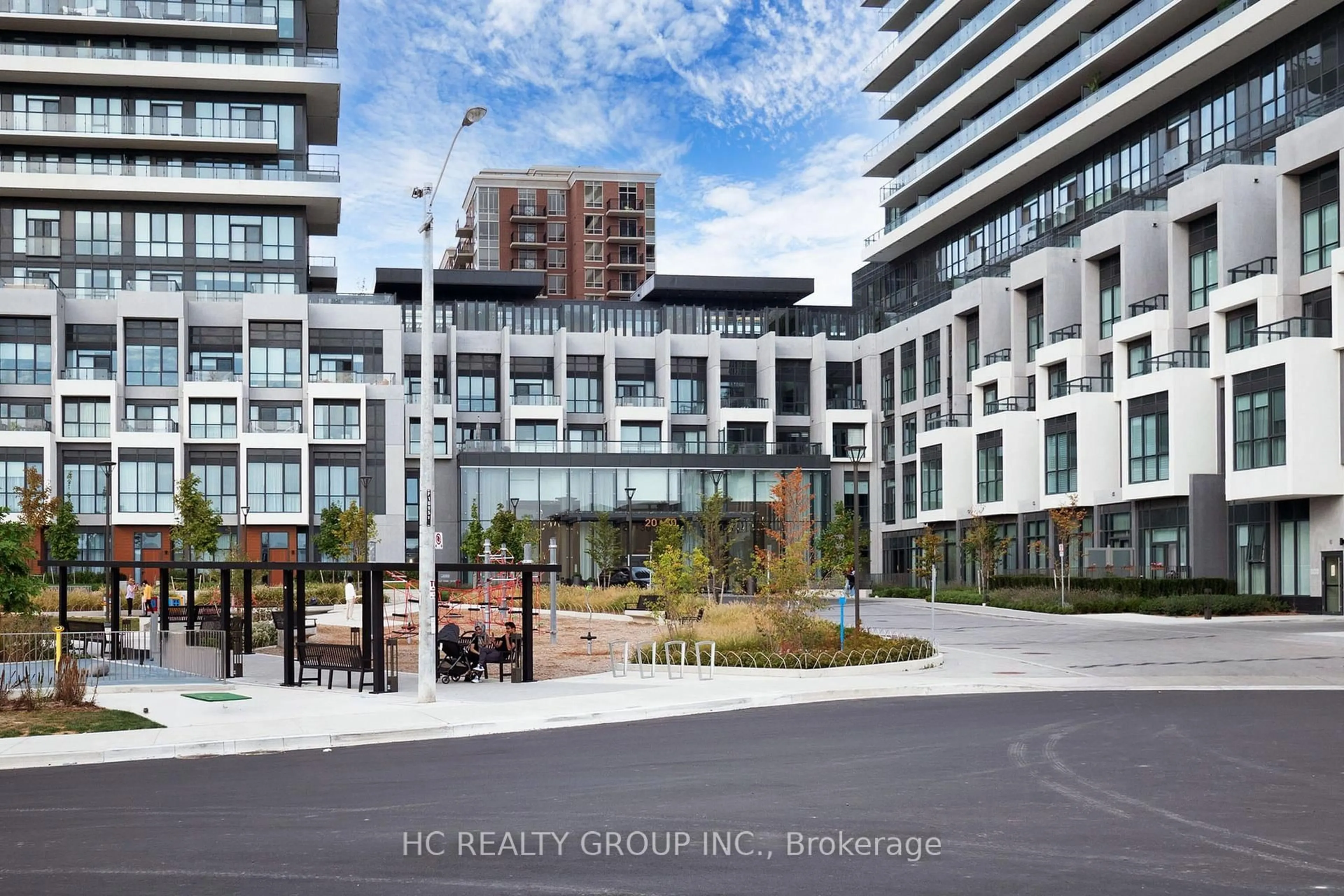 A pic from outside/outdoor area/front of a property/back of a property/a pic from drone, city buildings view from balcony for 30 Inn On The Park Dr #222, Toronto Ontario M3C 0P7