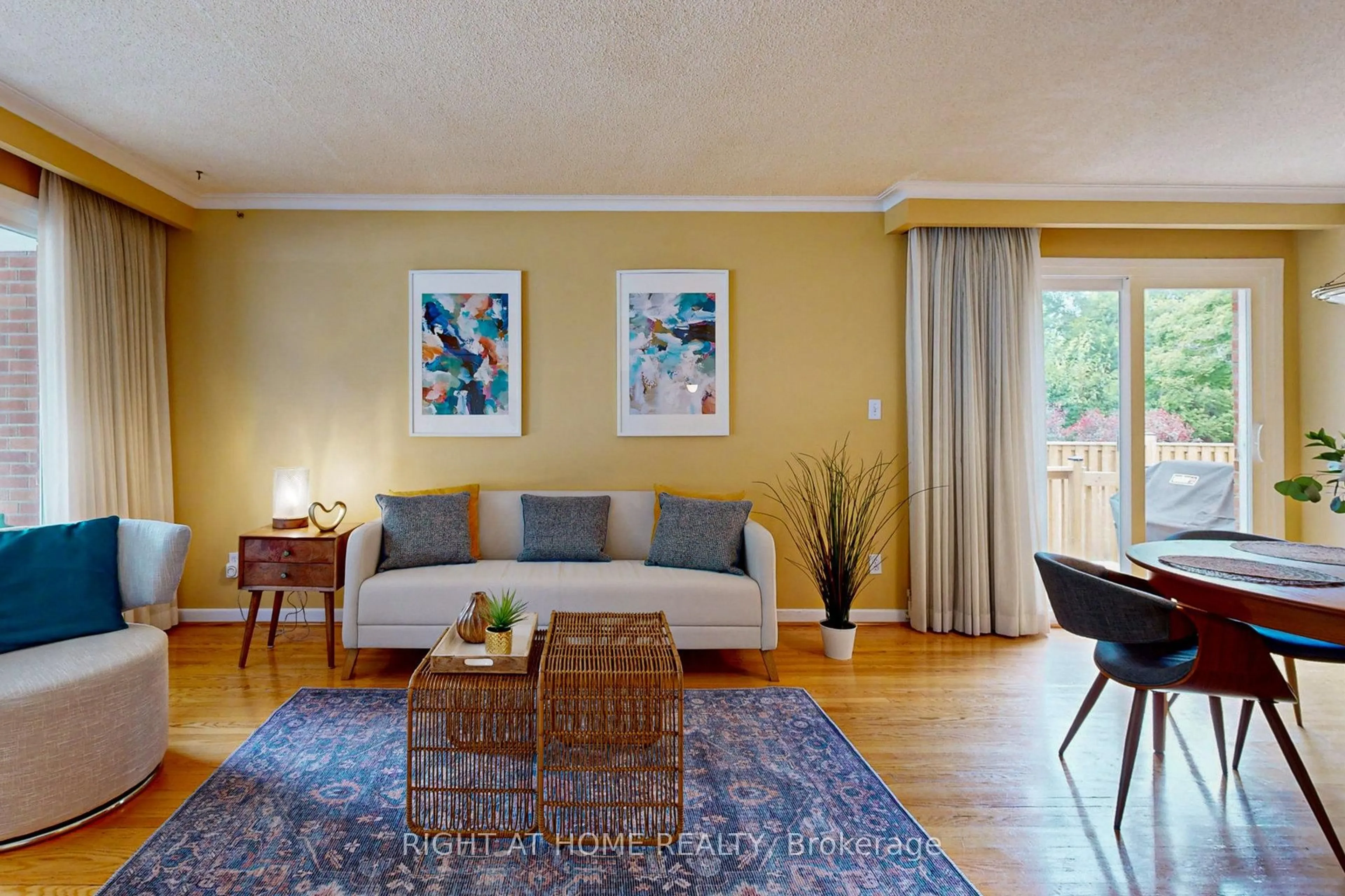 Living room with furniture, wood/laminate floor for 220 Homewood Ave, Toronto Ontario M2M 1K6