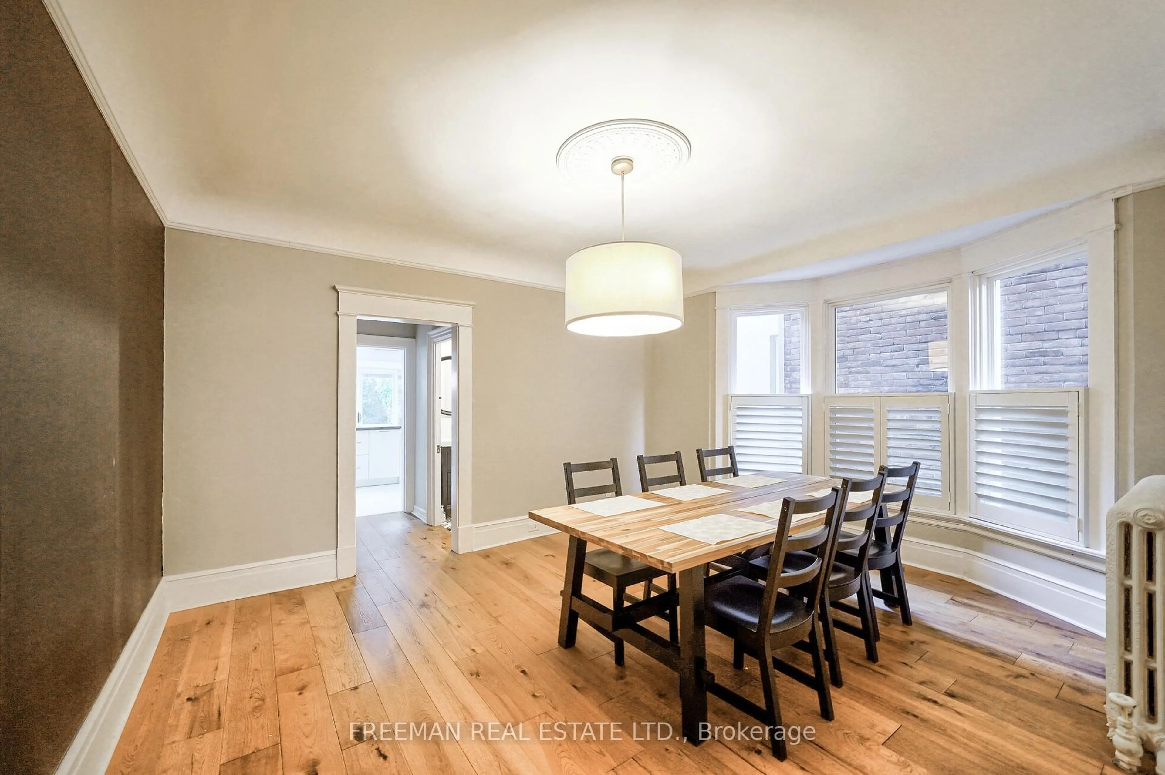 Dining room, wood/laminate floor for 555 Markham St, Toronto Ontario M6G 2L6