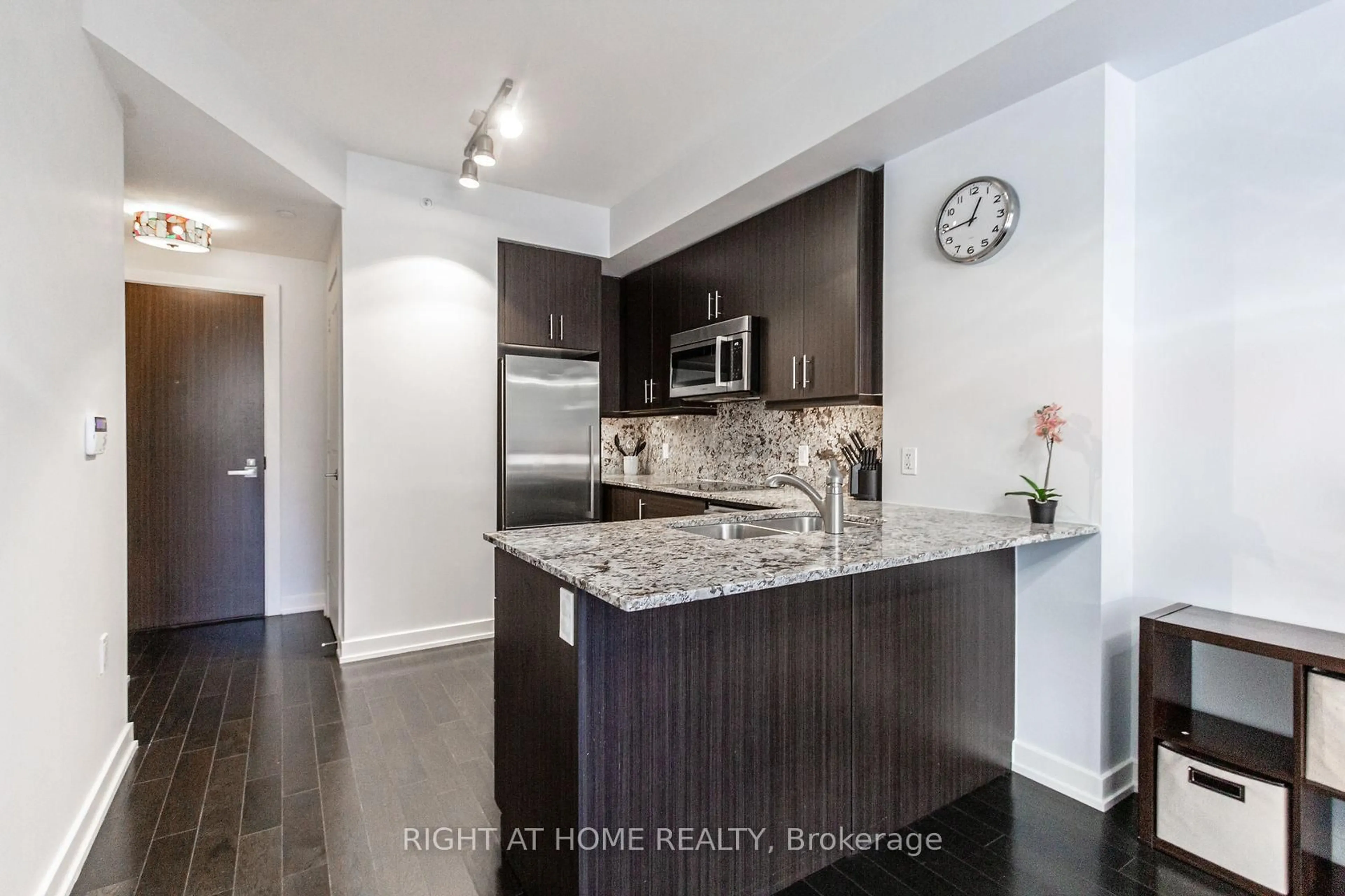 Open concept kitchen, wood/laminate floor for 1 The Esplanade #301, Toronto Ontario M5E 0A8