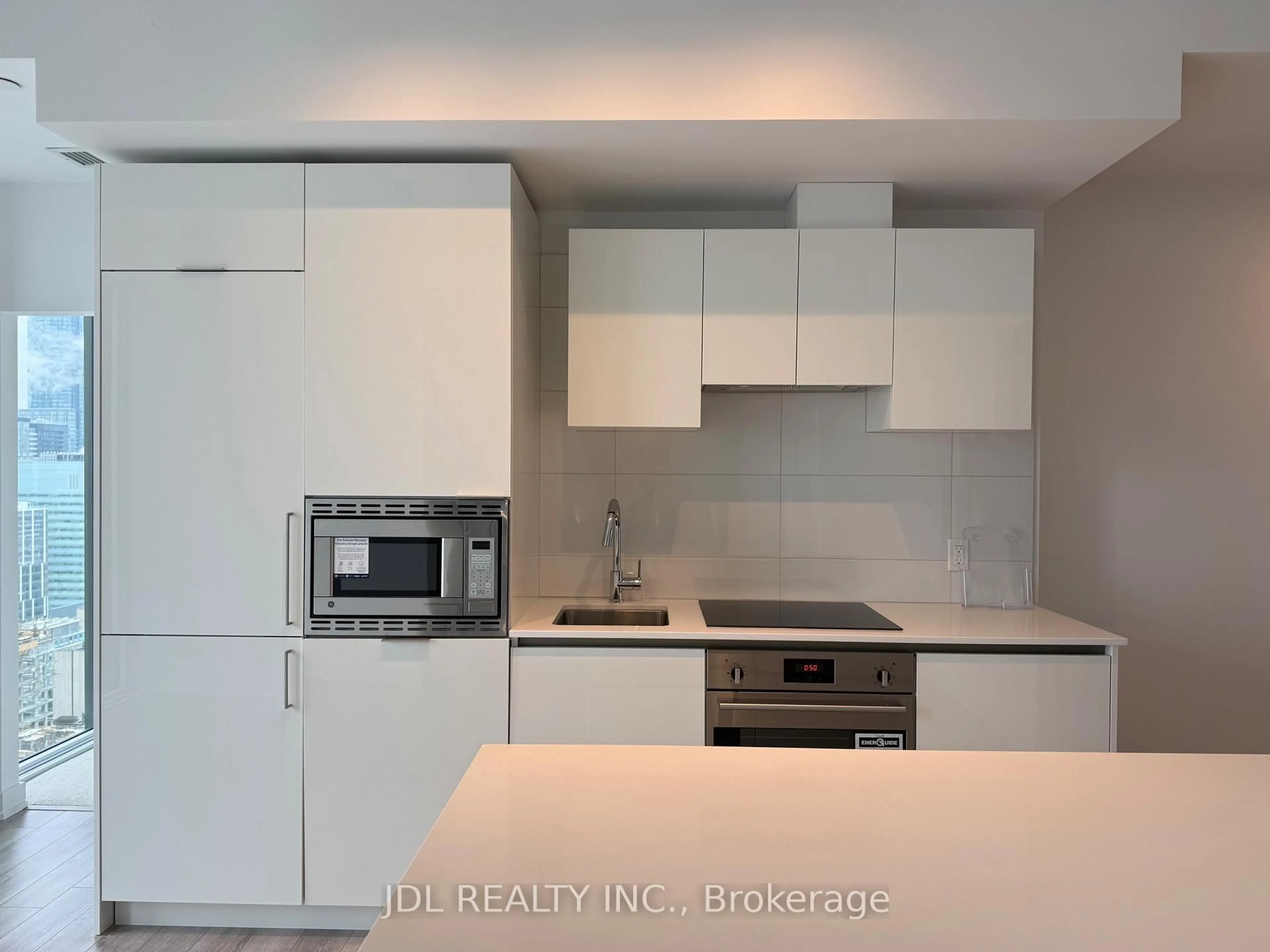 Standard kitchen, wood/laminate floor for 238 Simcoe St #3709, Toronto Ontario M5T 3B9