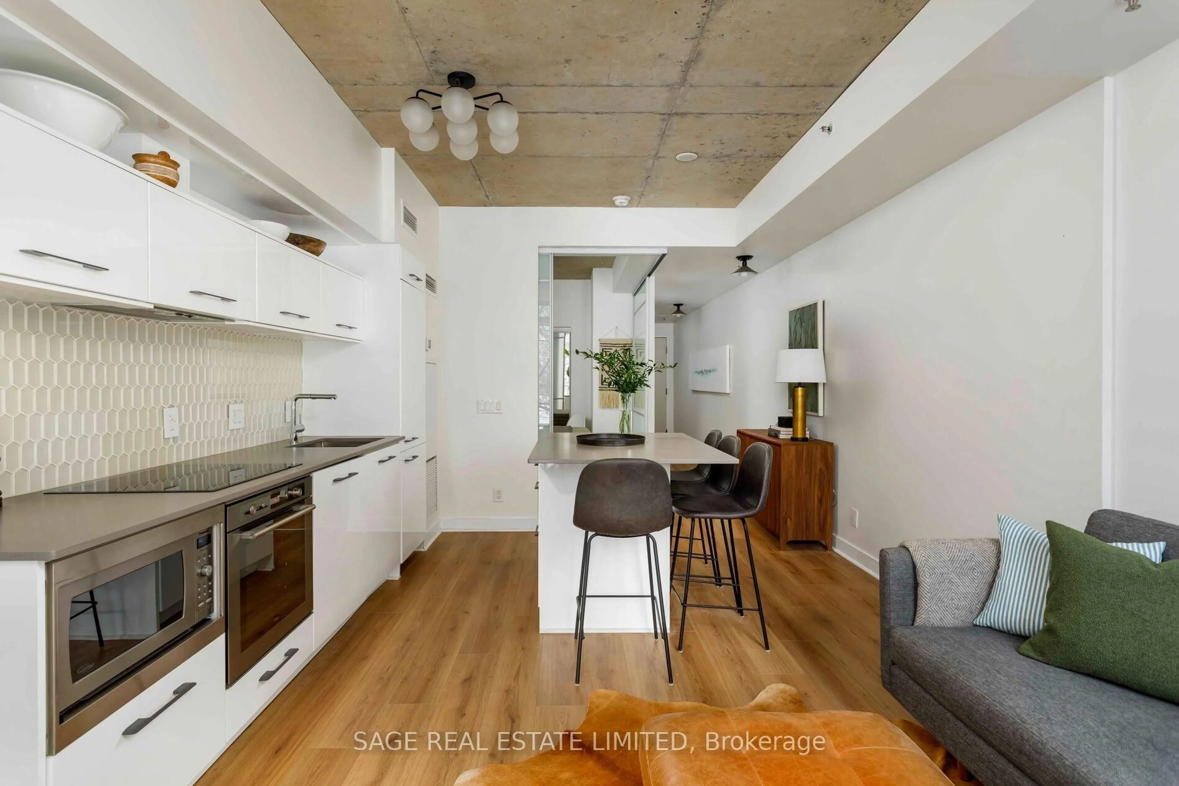 Open concept kitchen, wood/laminate floor for 707 Dovercourt Rd #206, Toronto Ontario M6H 0B5