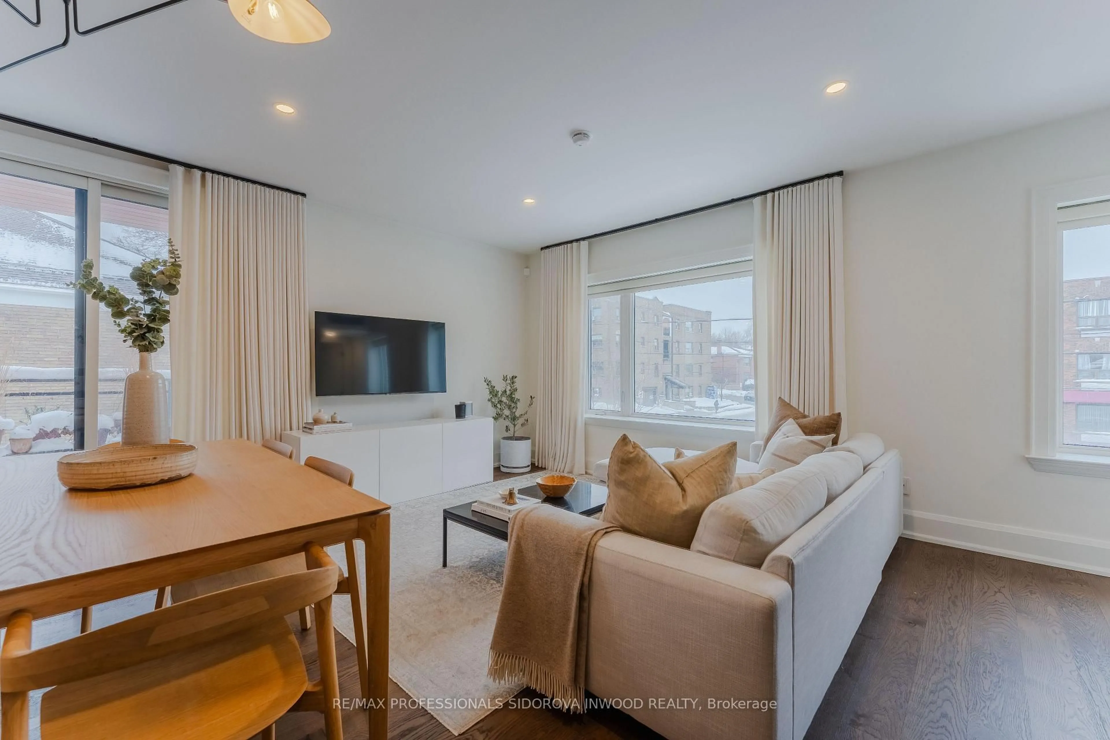 Living room with furniture, wood/laminate floor for 1657 Bathurst St #3A, Toronto Ontario M5P 3J8
