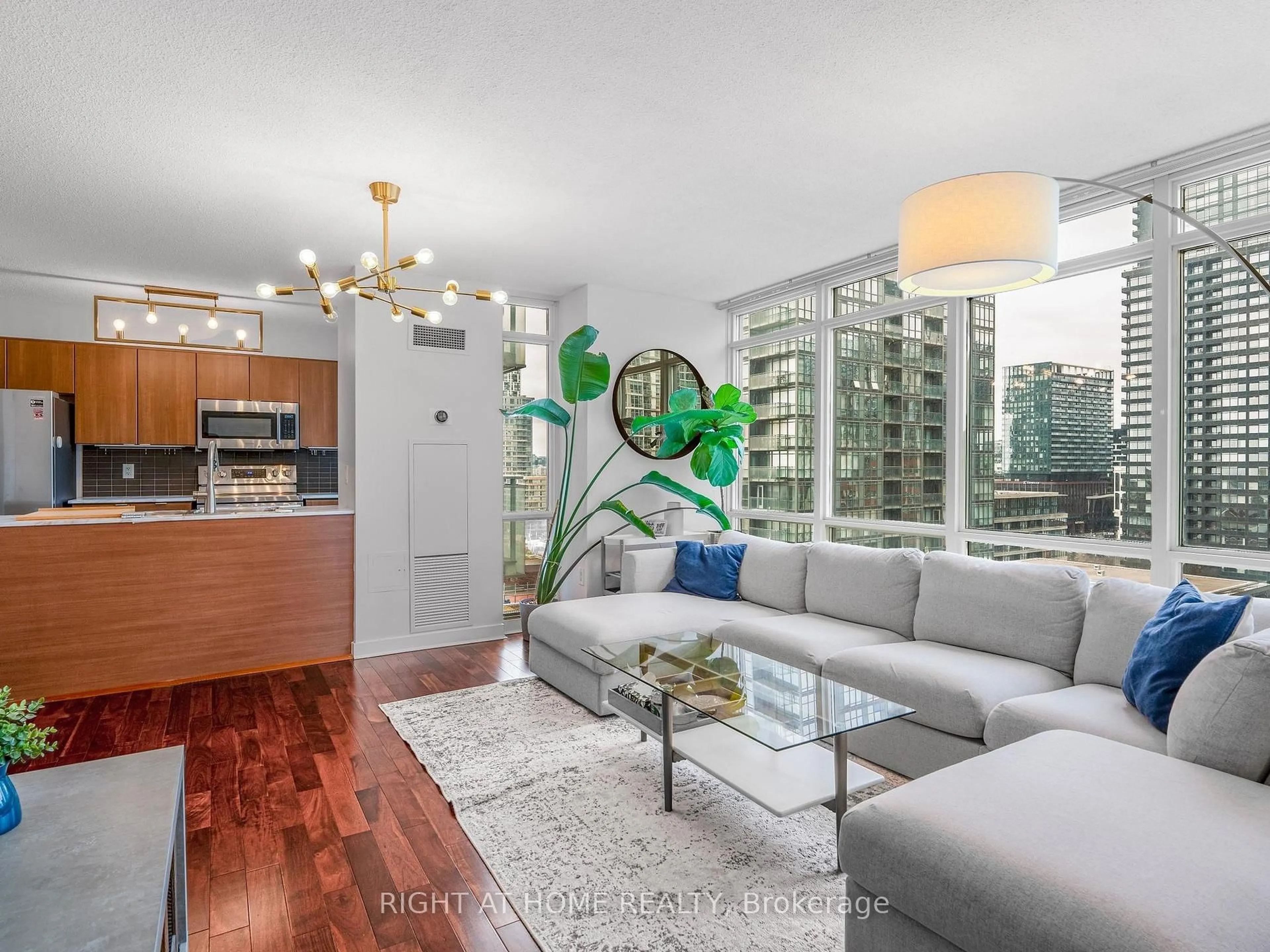 Living room with furniture, unknown for 11 Brunel Crt #1706, Toronto Ontario M5V 3Y3