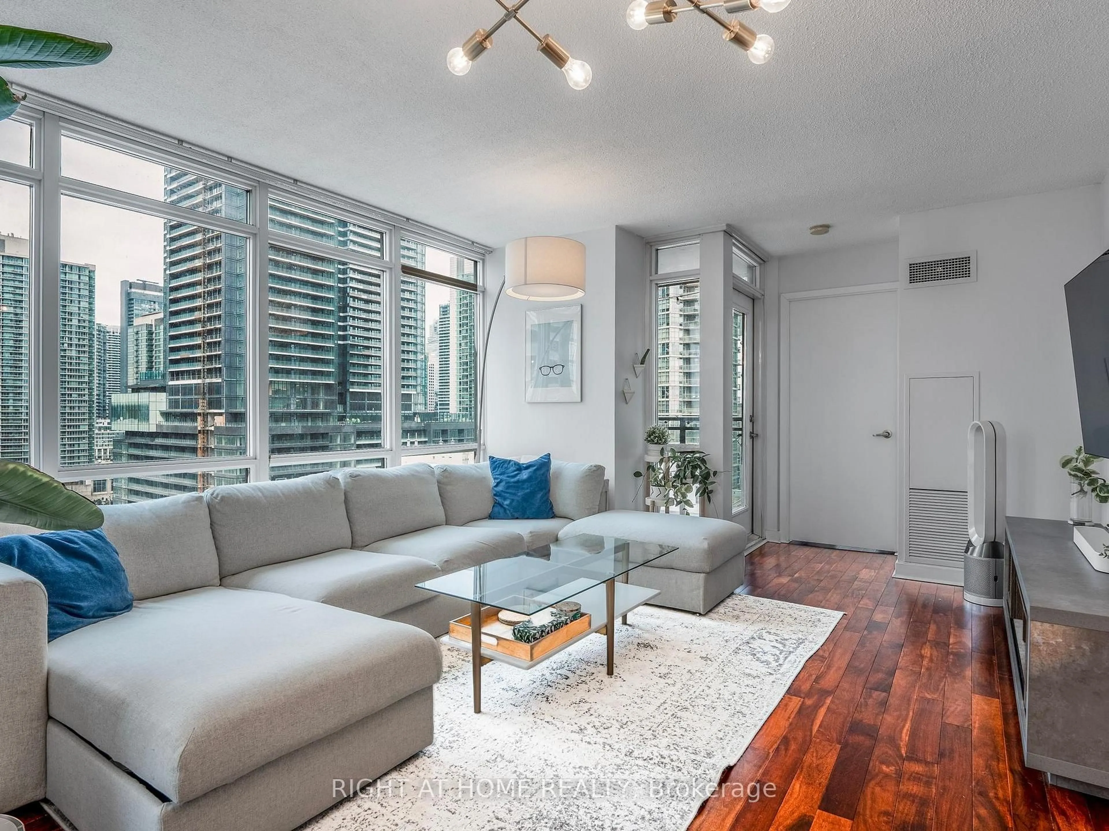 Living room with furniture, unknown for 11 Brunel Crt #1706, Toronto Ontario M5V 3Y3