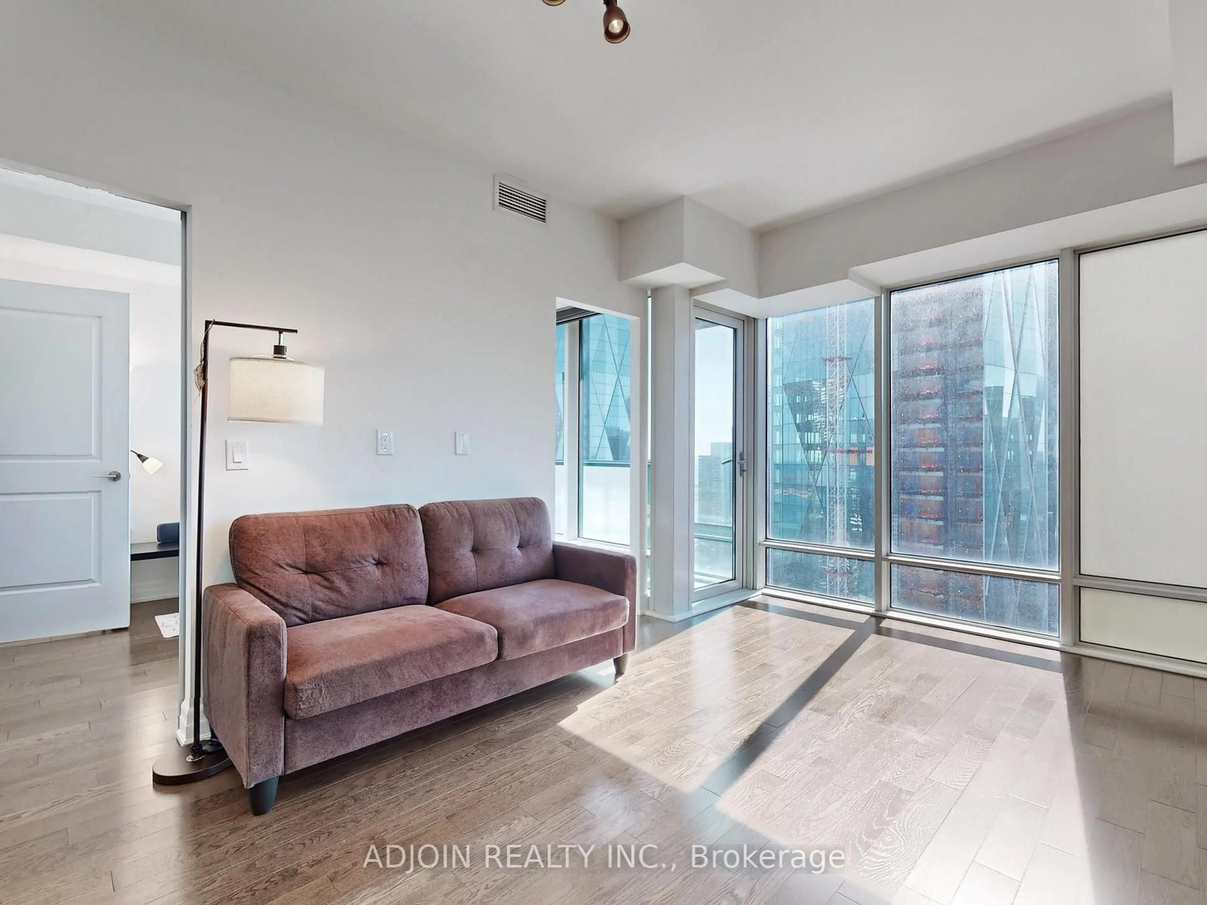 Living room with furniture, unknown for 8 The Esplanade #5303, Toronto Ontario M5E 0A6