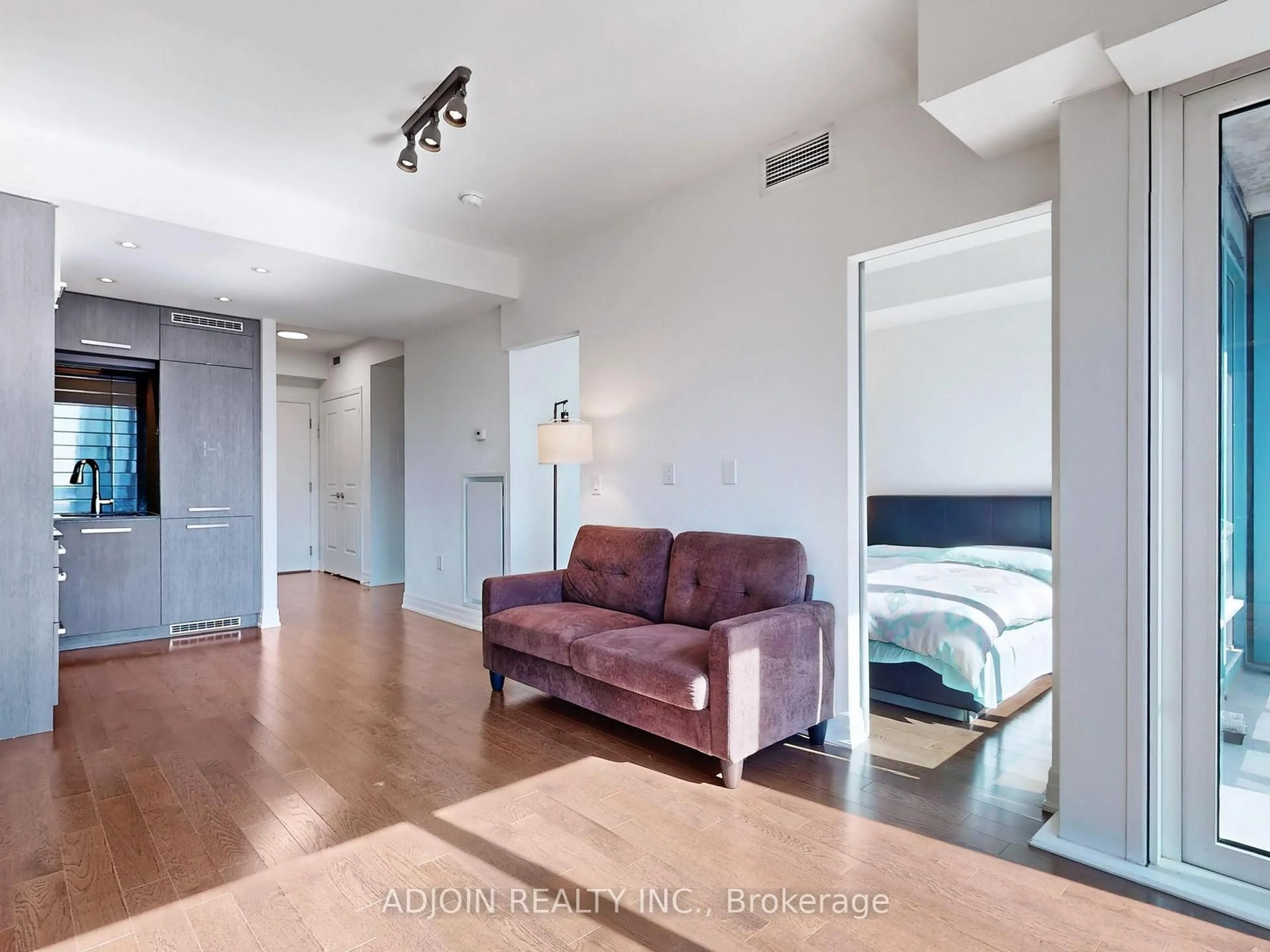 Living room with furniture, unknown for 8 The Esplanade #5303, Toronto Ontario M5E 0A6