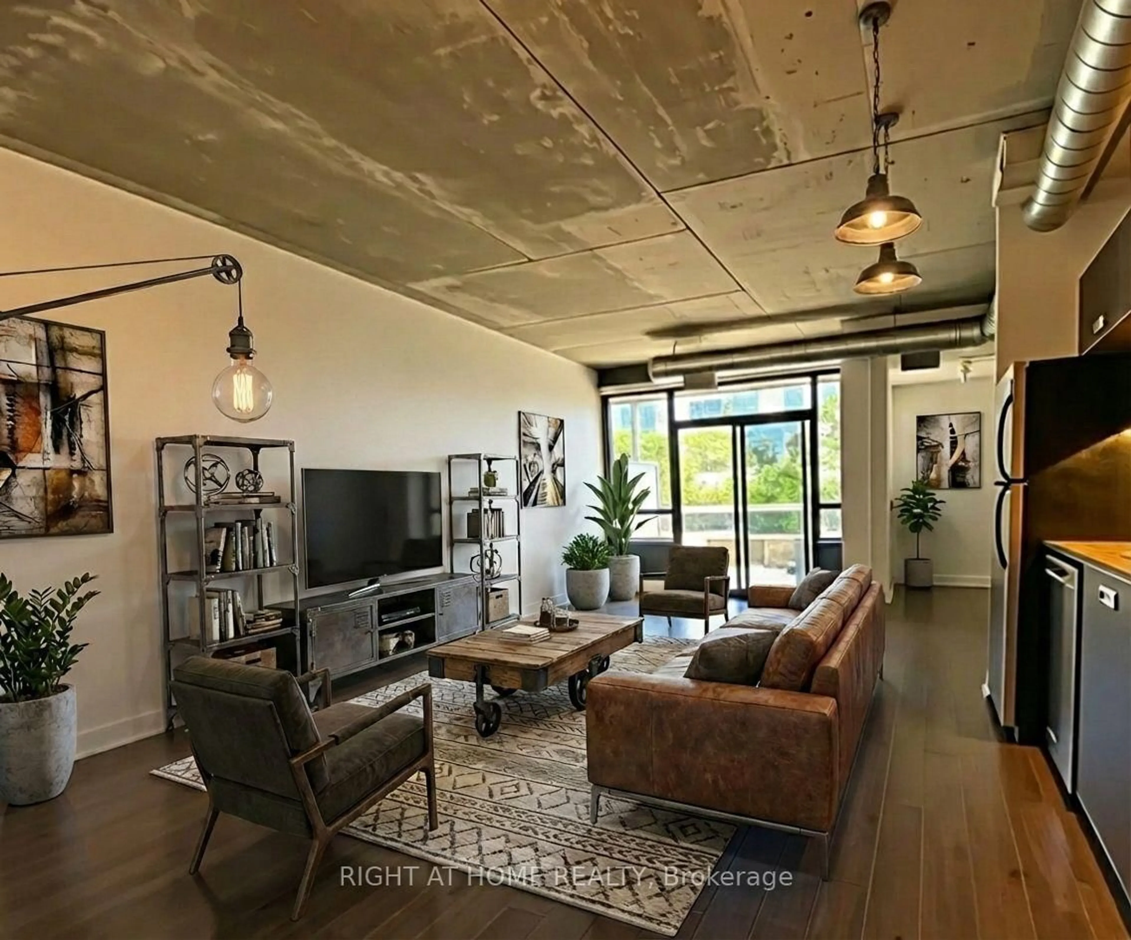 Living room with furniture, cement floor for 62 Niagara St #319, Toronto Ontario M5V 1C5