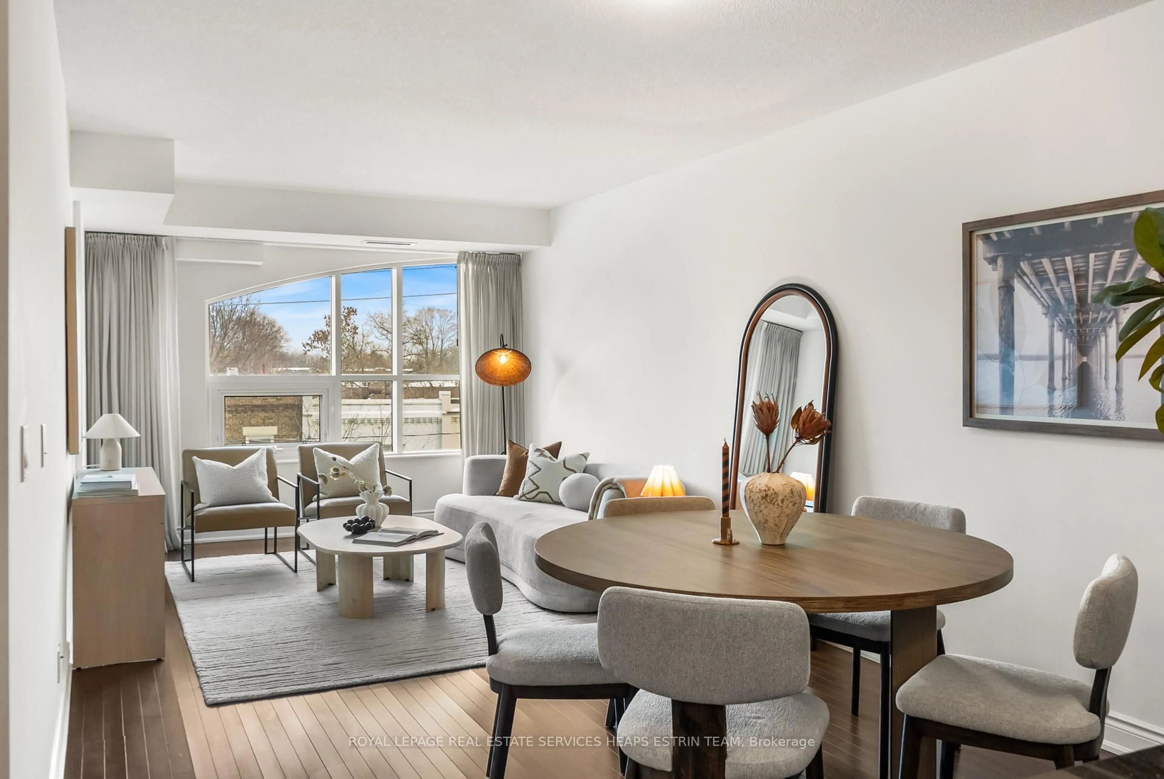 Living room with furniture, wood/laminate floor for 650 Mount Pleasant Rd #308, Toronto Ontario M4S 2N5