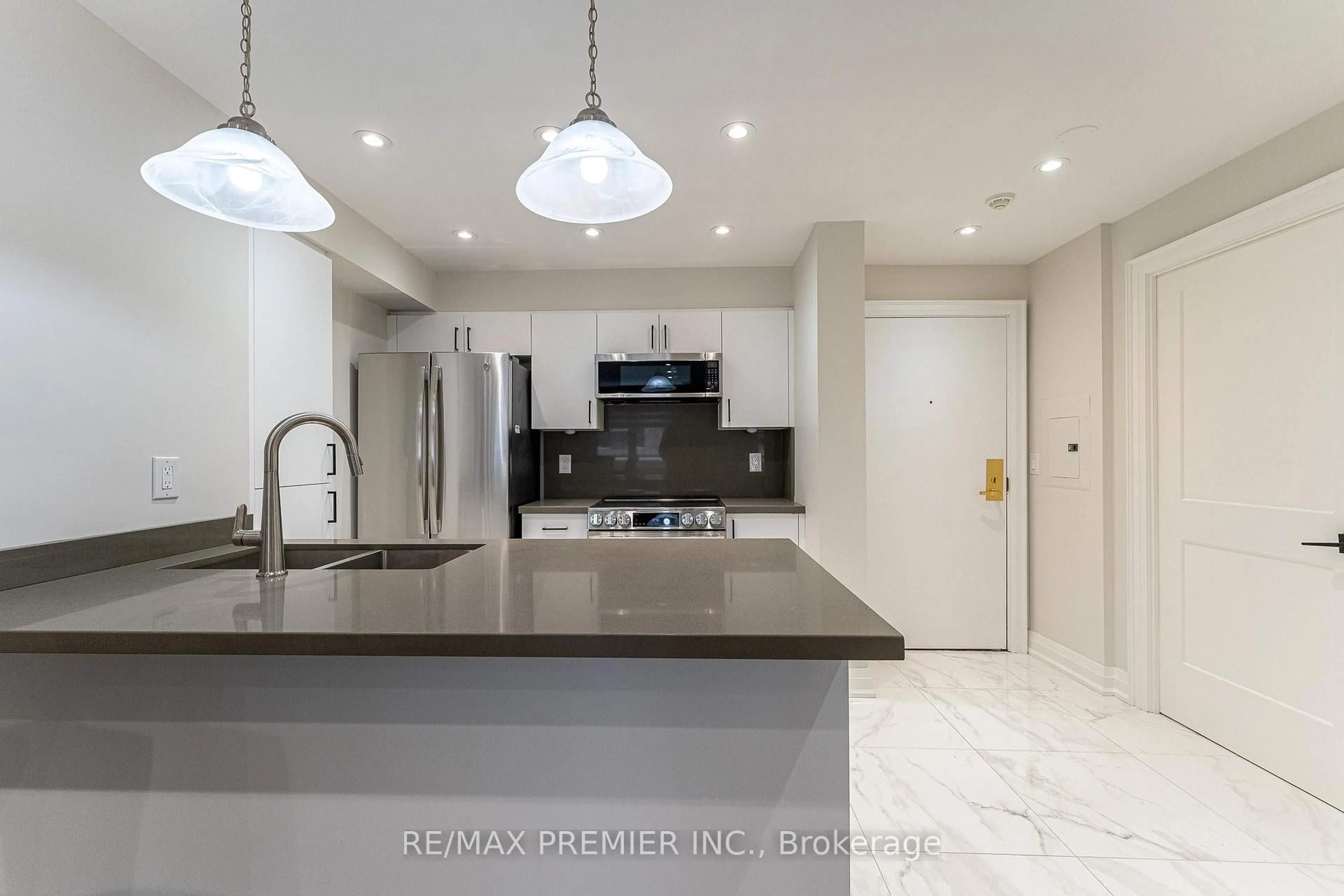 Open concept kitchen, ceramic/tile floor for 1 Balmoral Ave #205, Toronto Ontario M4V 3B9
