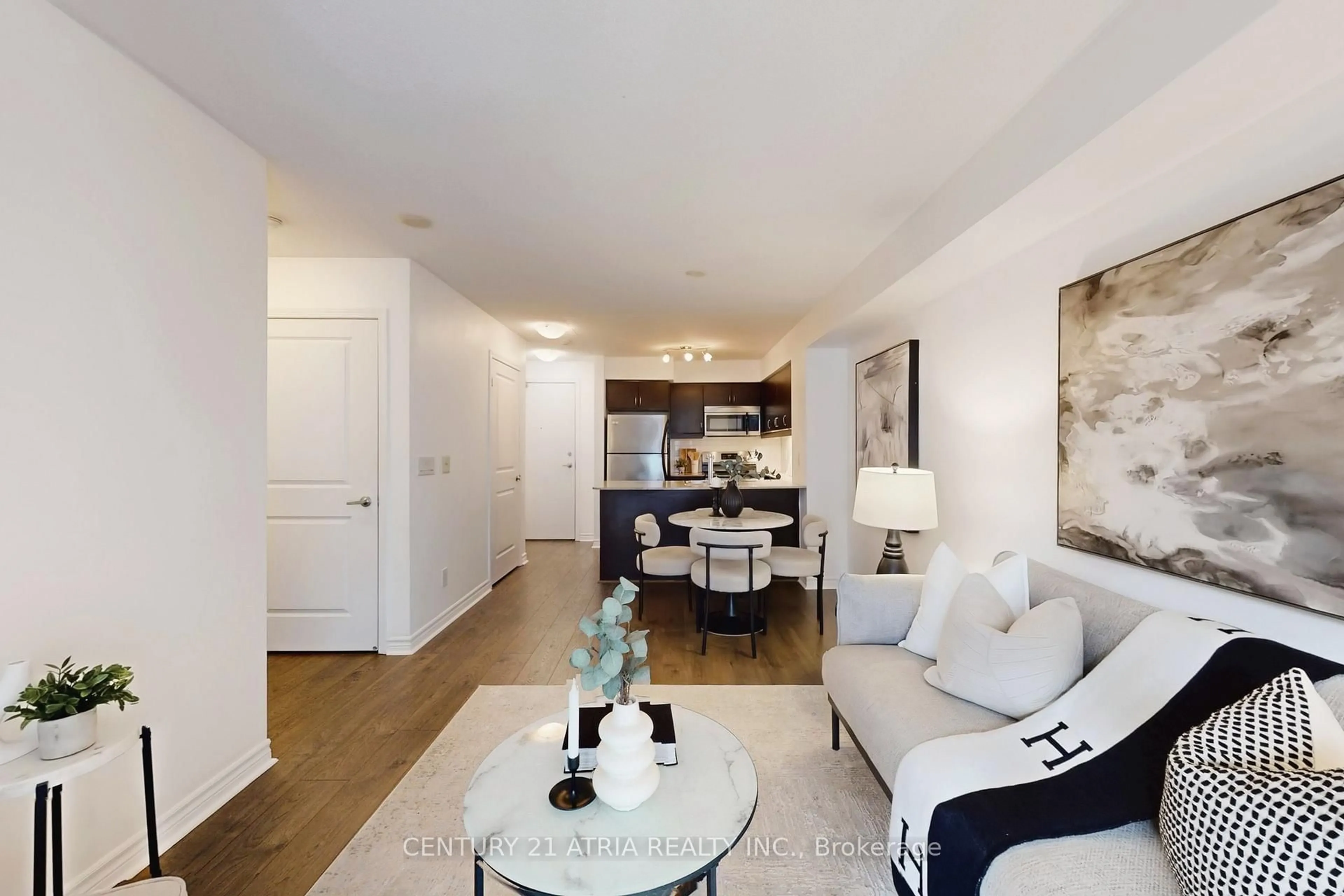 Living room with furniture, wood/laminate floor for 27 Rean Dr #405, Toronto Ontario M2K 0A6