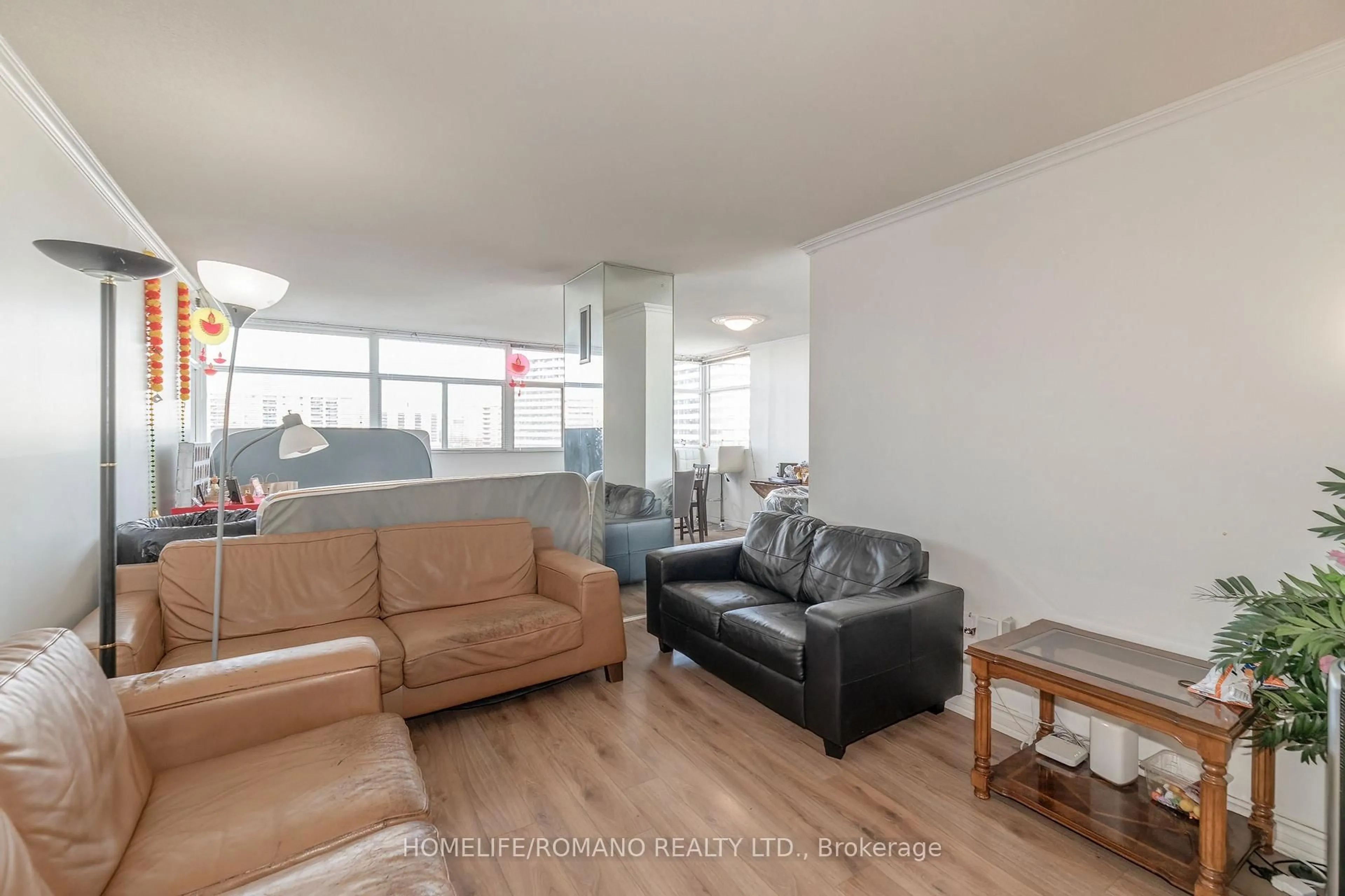 Living room with furniture, unknown for 100 Antibes Dr #702, Toronto Ontario M2R 3N1