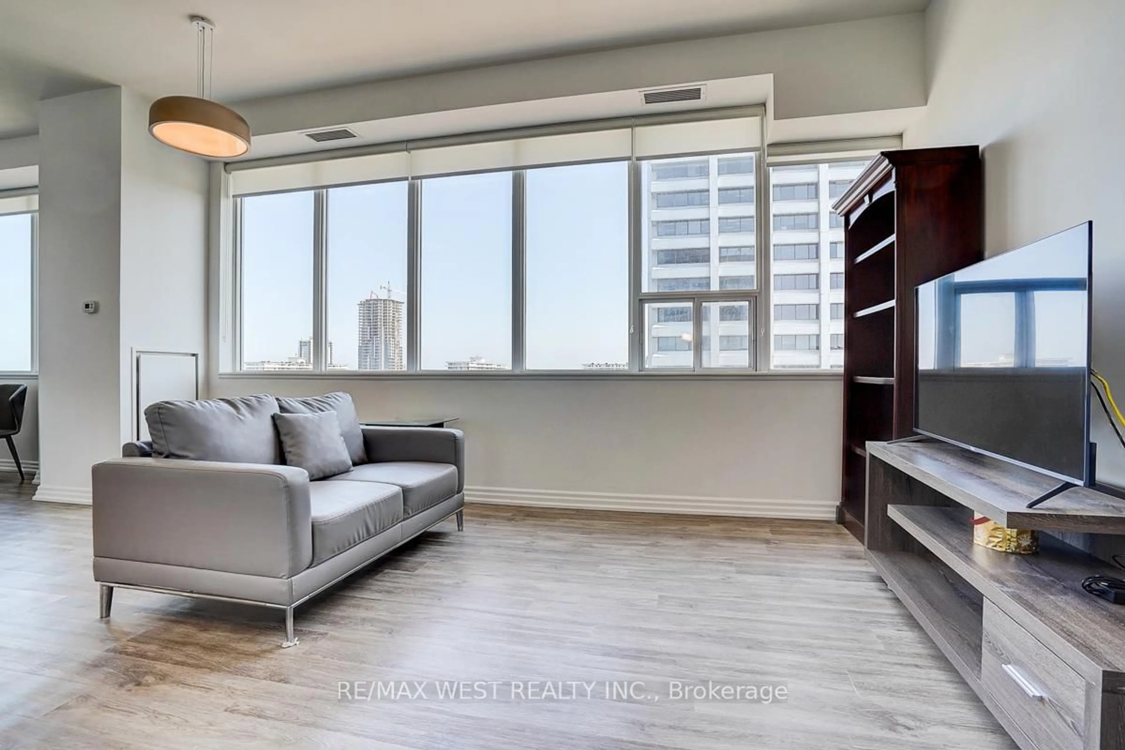 Living room with furniture, unknown for 797 Don Mills Rd #1001, Toronto Ontario M3C 1V1