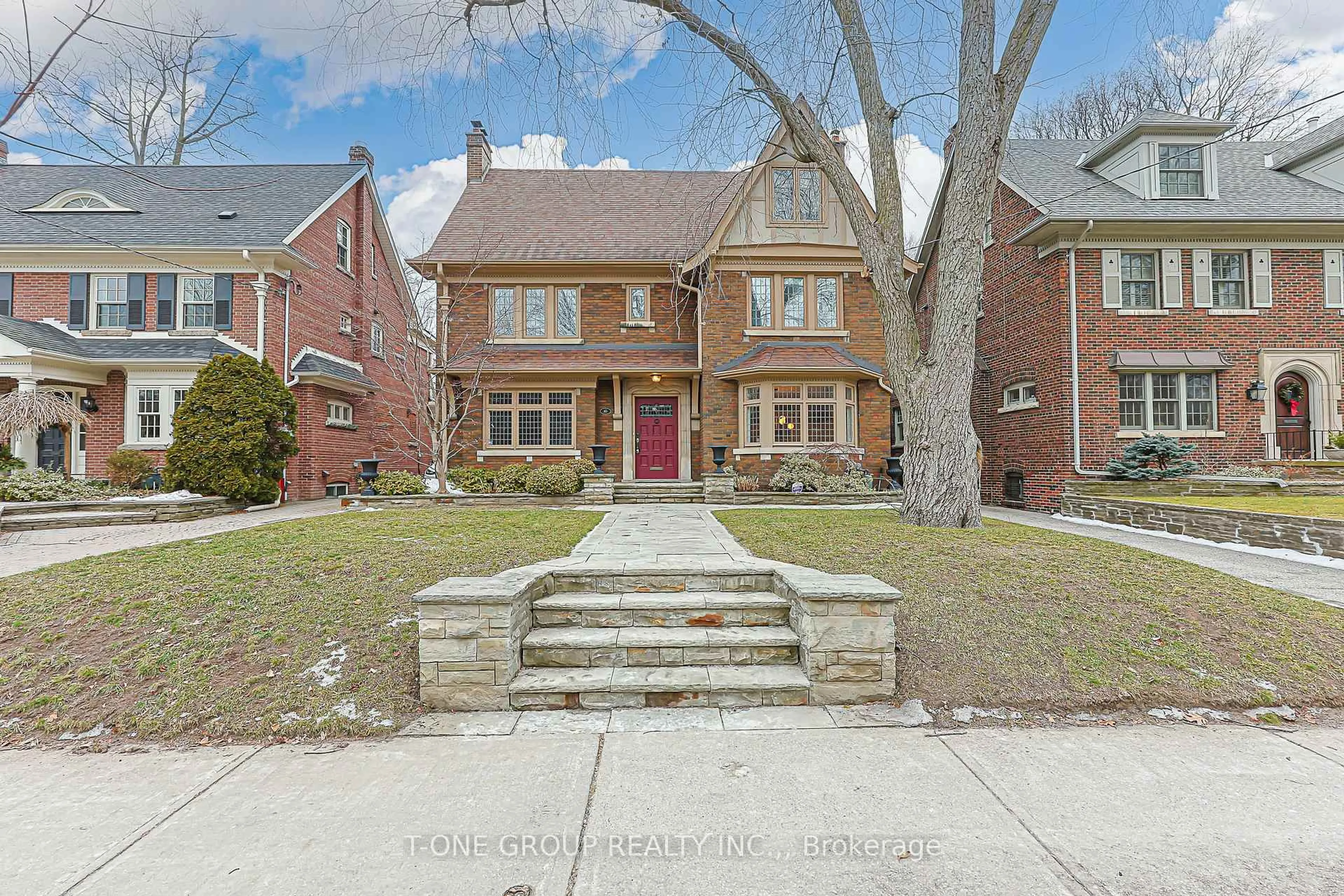 Home with brick exterior material, street for 80 Douglas Dr, Toronto Ontario M4W 2B4
