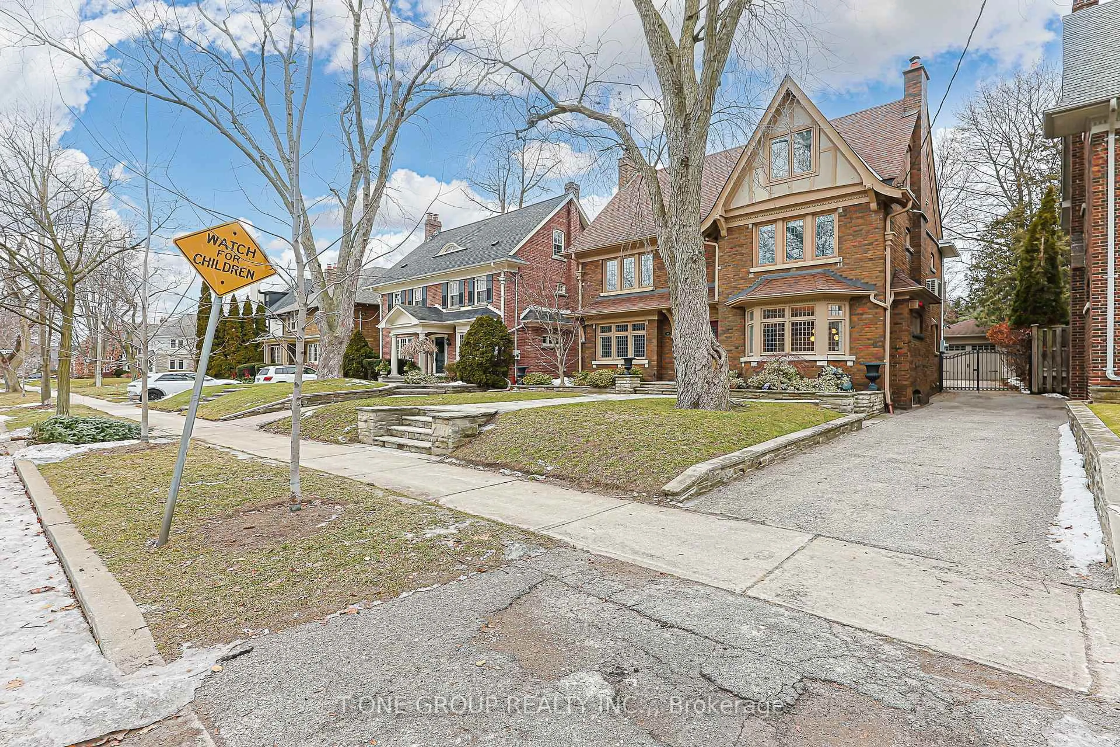 Home with brick exterior material, street for 80 Douglas Dr, Toronto Ontario M4W 2B4