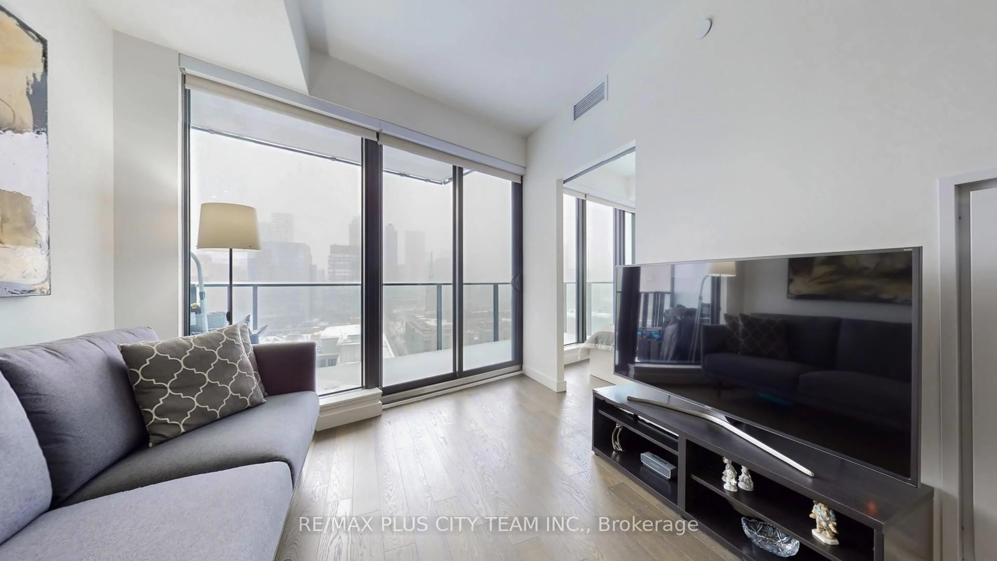 Living room with furniture, unknown for 2A Church St #1909, Toronto Ontario M5E 0E1