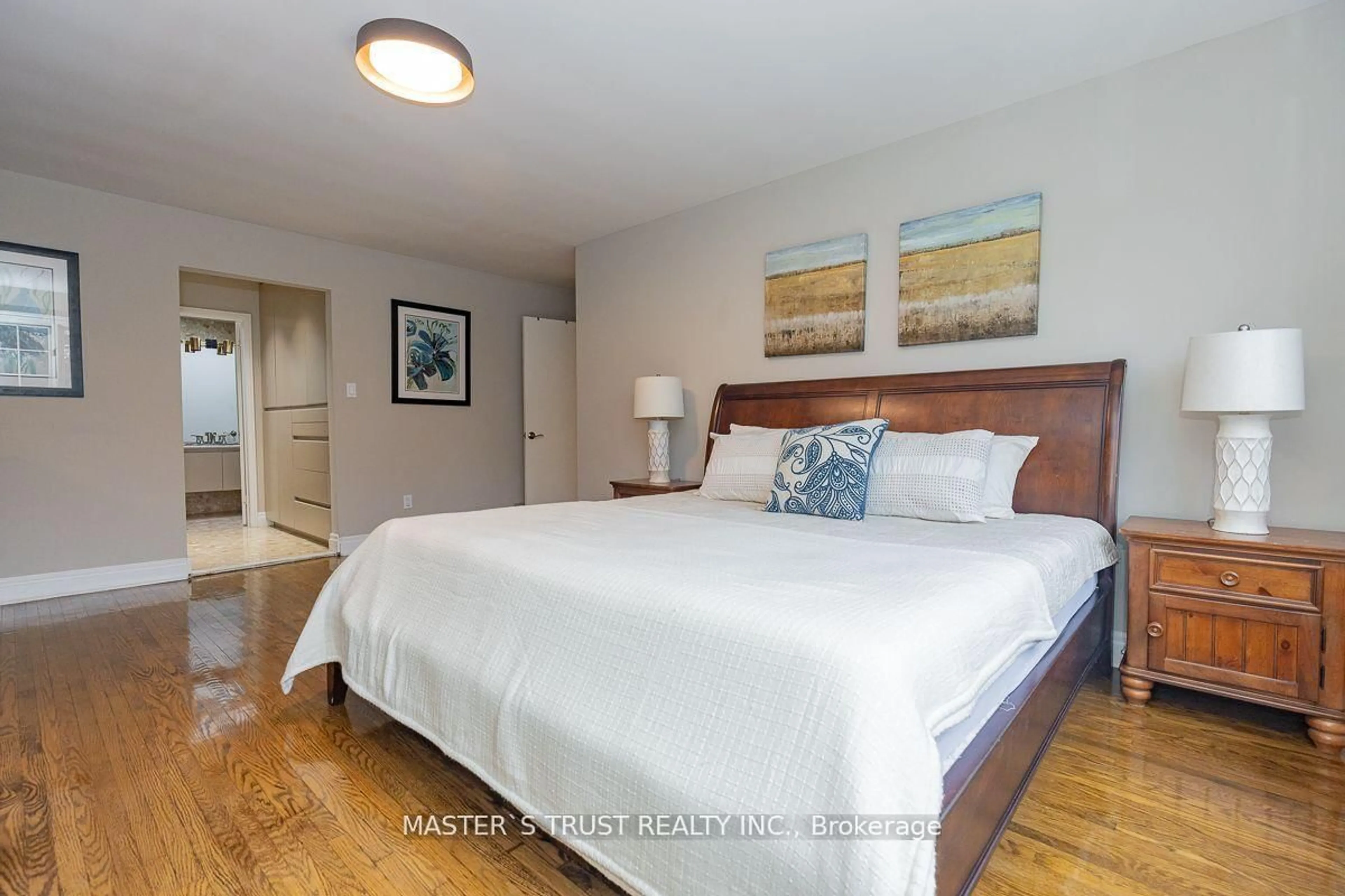 Bedroom with bed, wood/laminate floor for 153 Banbury Rd, Toronto Ontario M3B 2L7