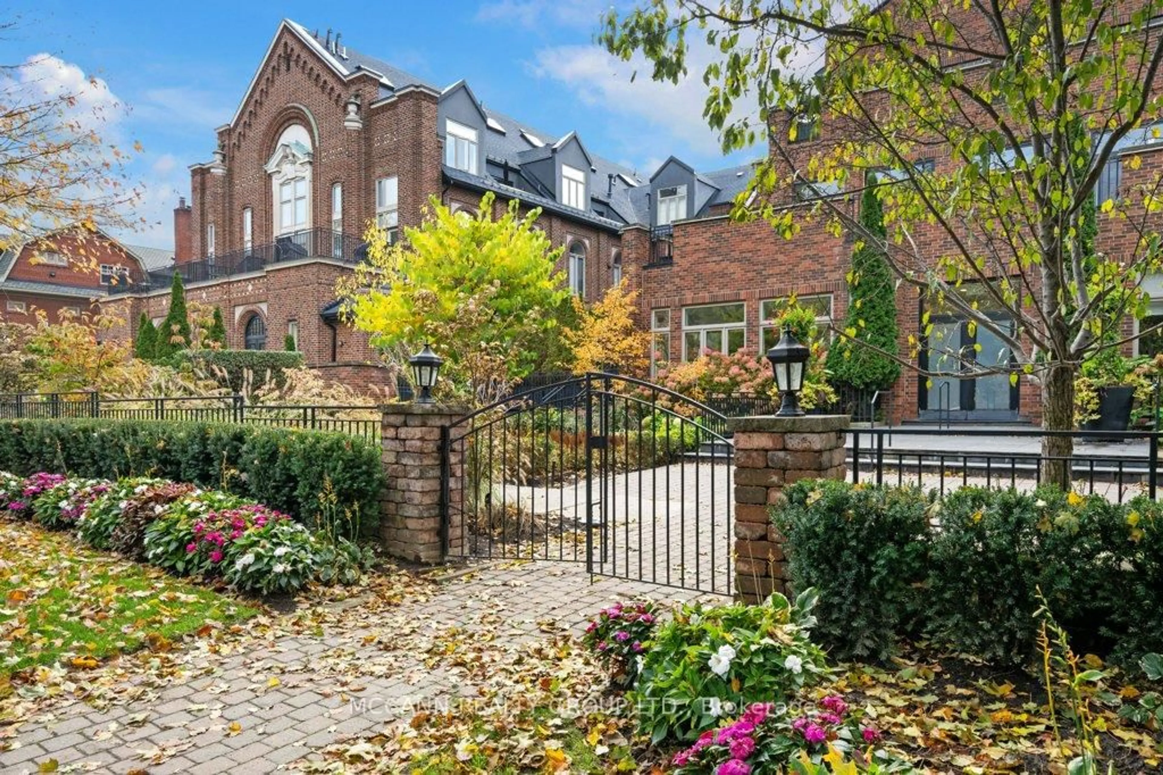 Home with brick exterior material, street for 65 Sheldrake Blvd #208, Toronto Ontario M4P 2B1