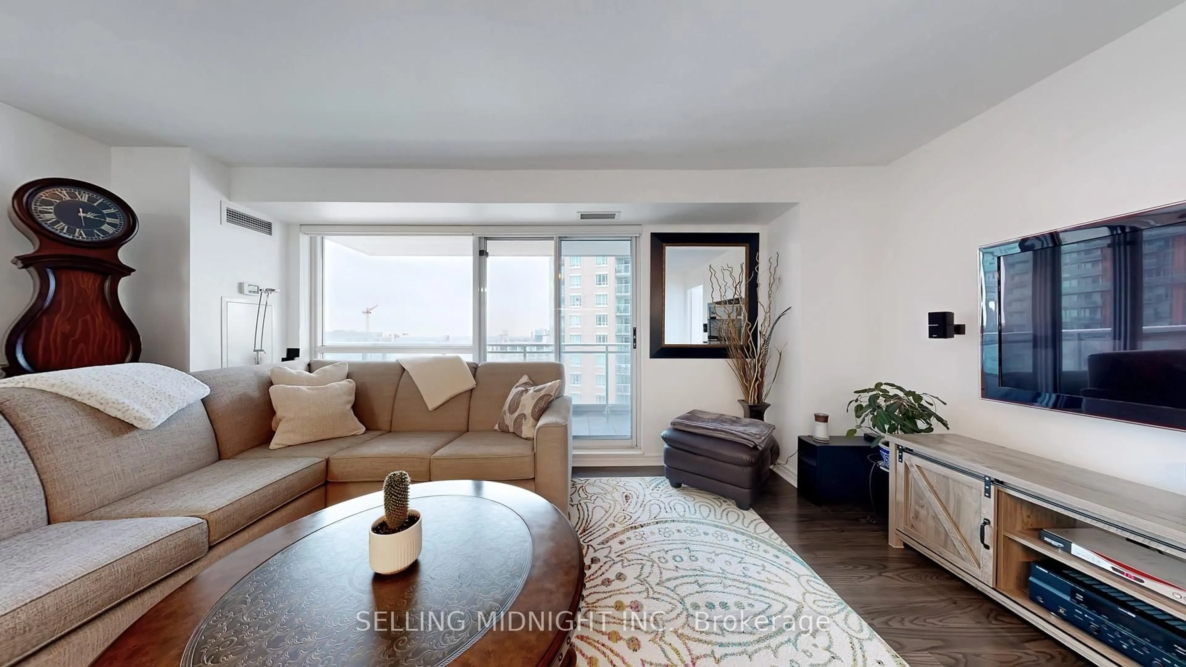 Living room with furniture, wood/laminate floor for 100 Western Battery Rd #1107, Toronto Ontario M6K 3S2