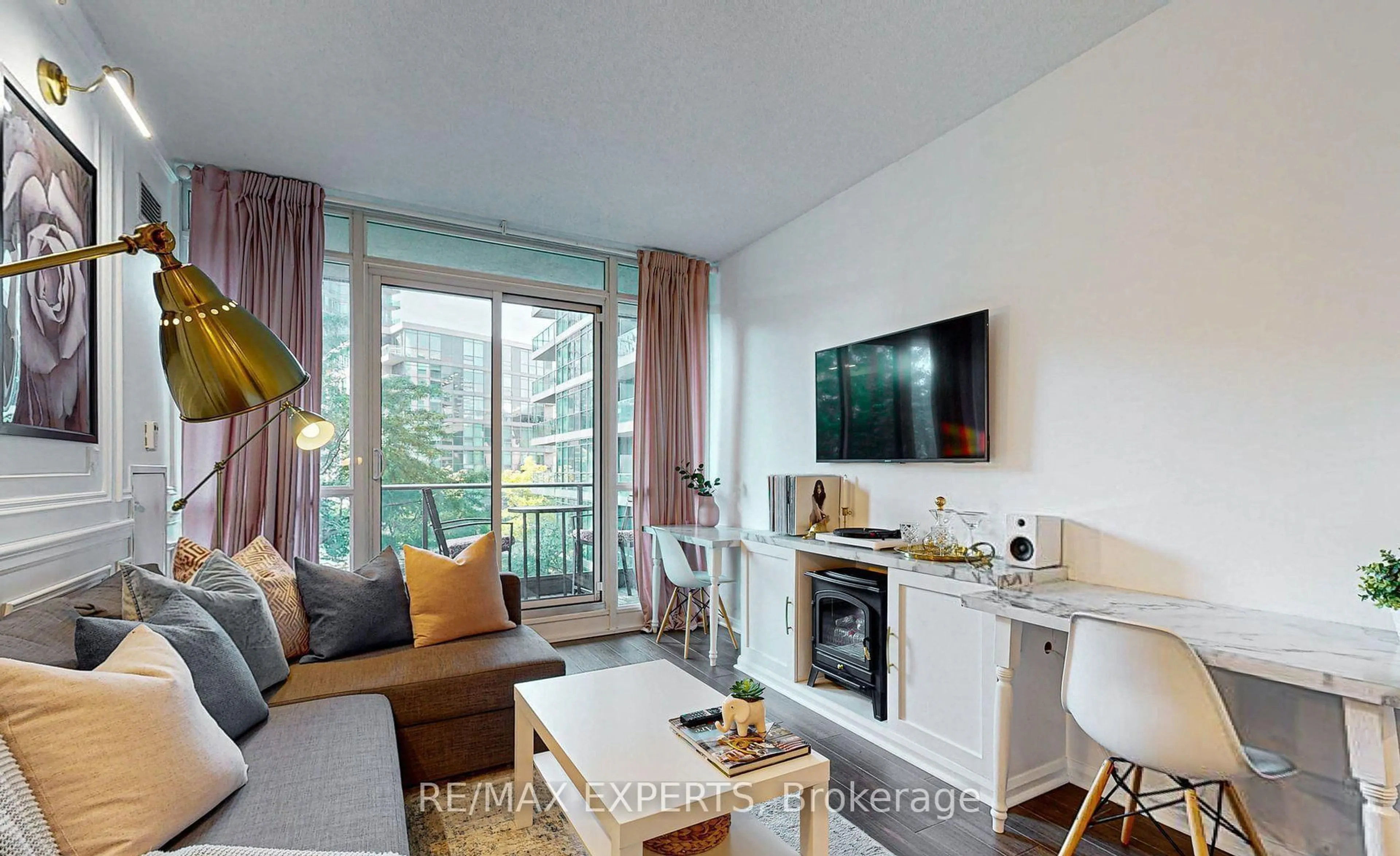 Living room with furniture, wood/laminate floor for 209 Fort York Blvd #355, Toronto Ontario M5V 4A1