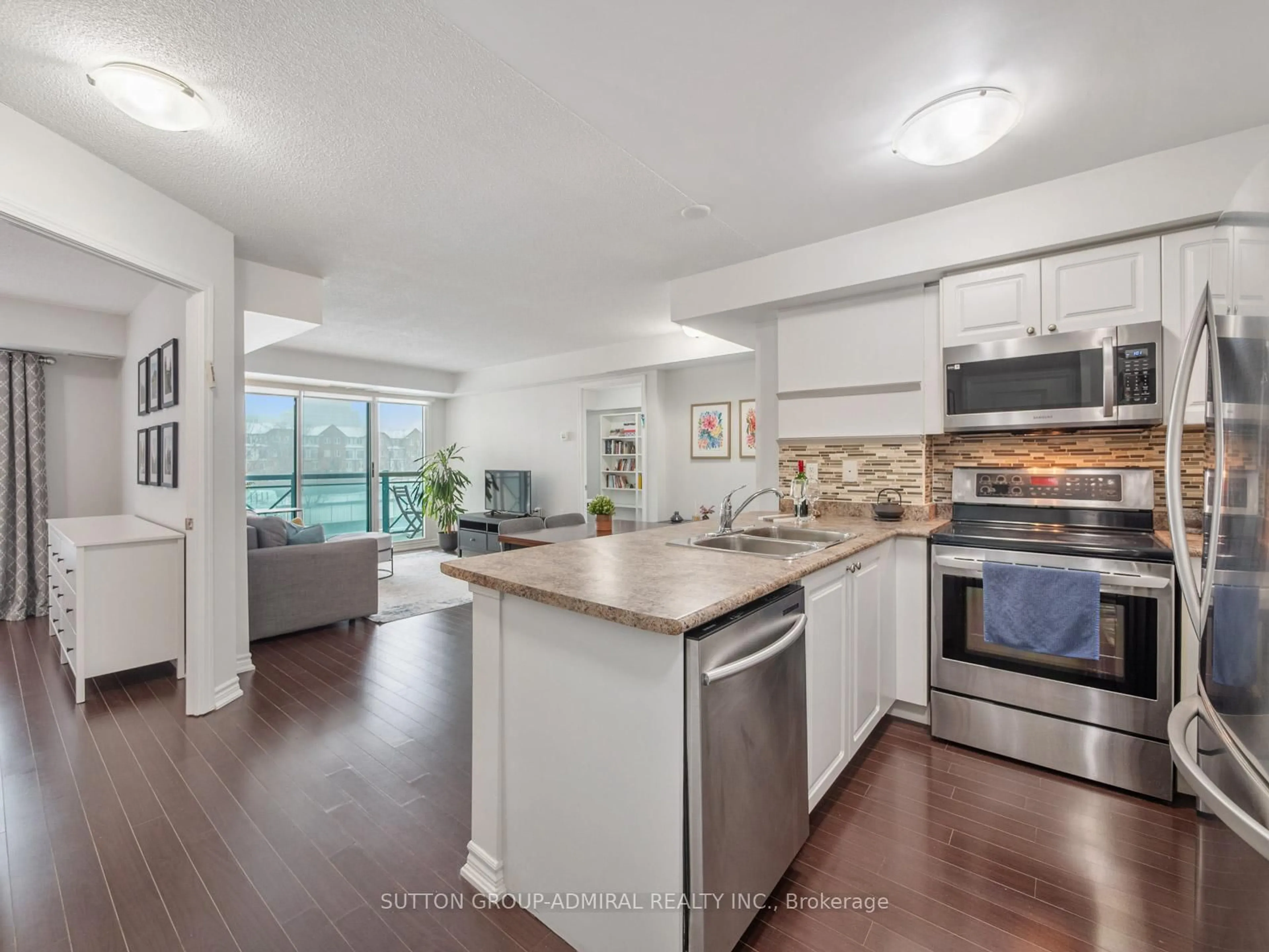 Open concept kitchen, unknown for 920 Sheppard Ave #201, Toronto Ontario M3H 0A2