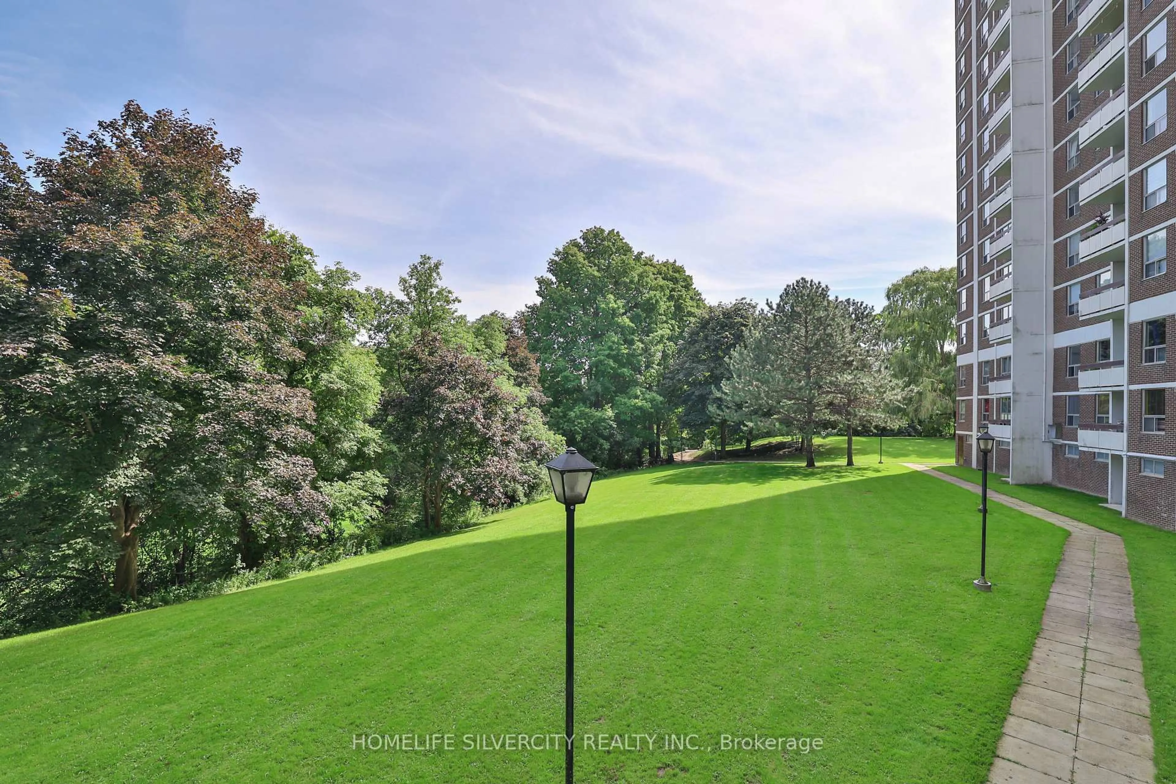A pic from outside/outdoor area/front of a property/back of a property/a pic from drone, forest/trees view for 20 Edgecliff Gfwy #105, Toronto Ontario M3C 3A4