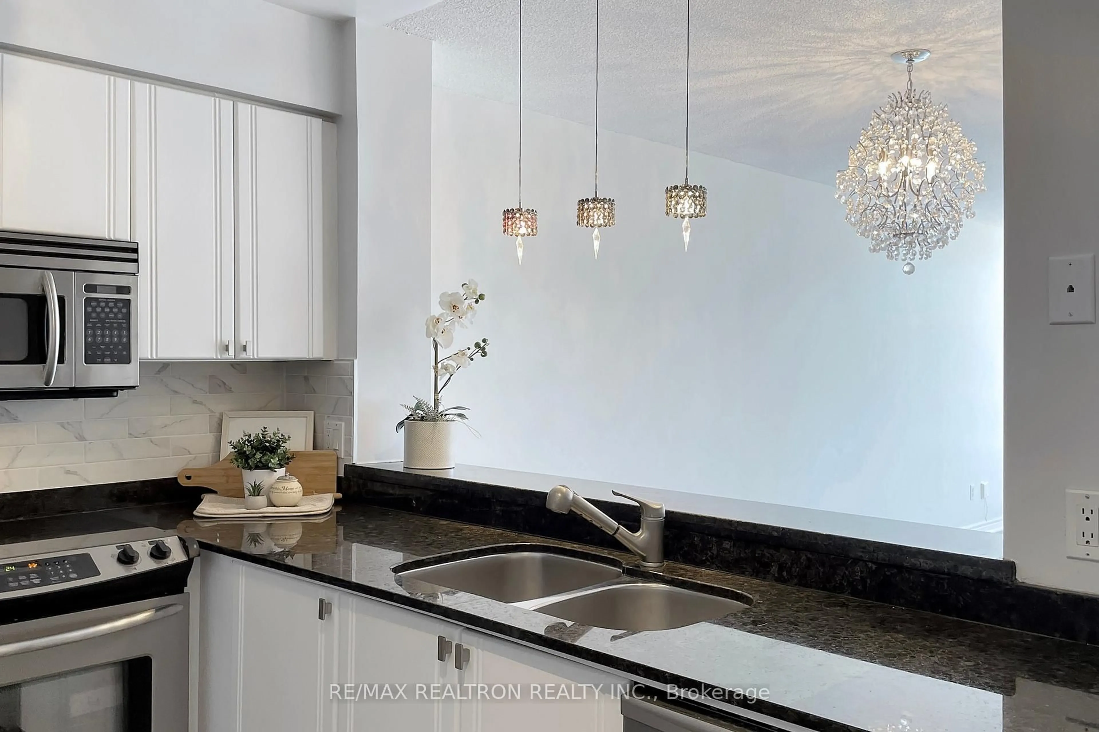 Contemporary kitchen, ceramic/tile floor for 1131 Steeles Ave #407, Toronto Ontario M2R 3W8