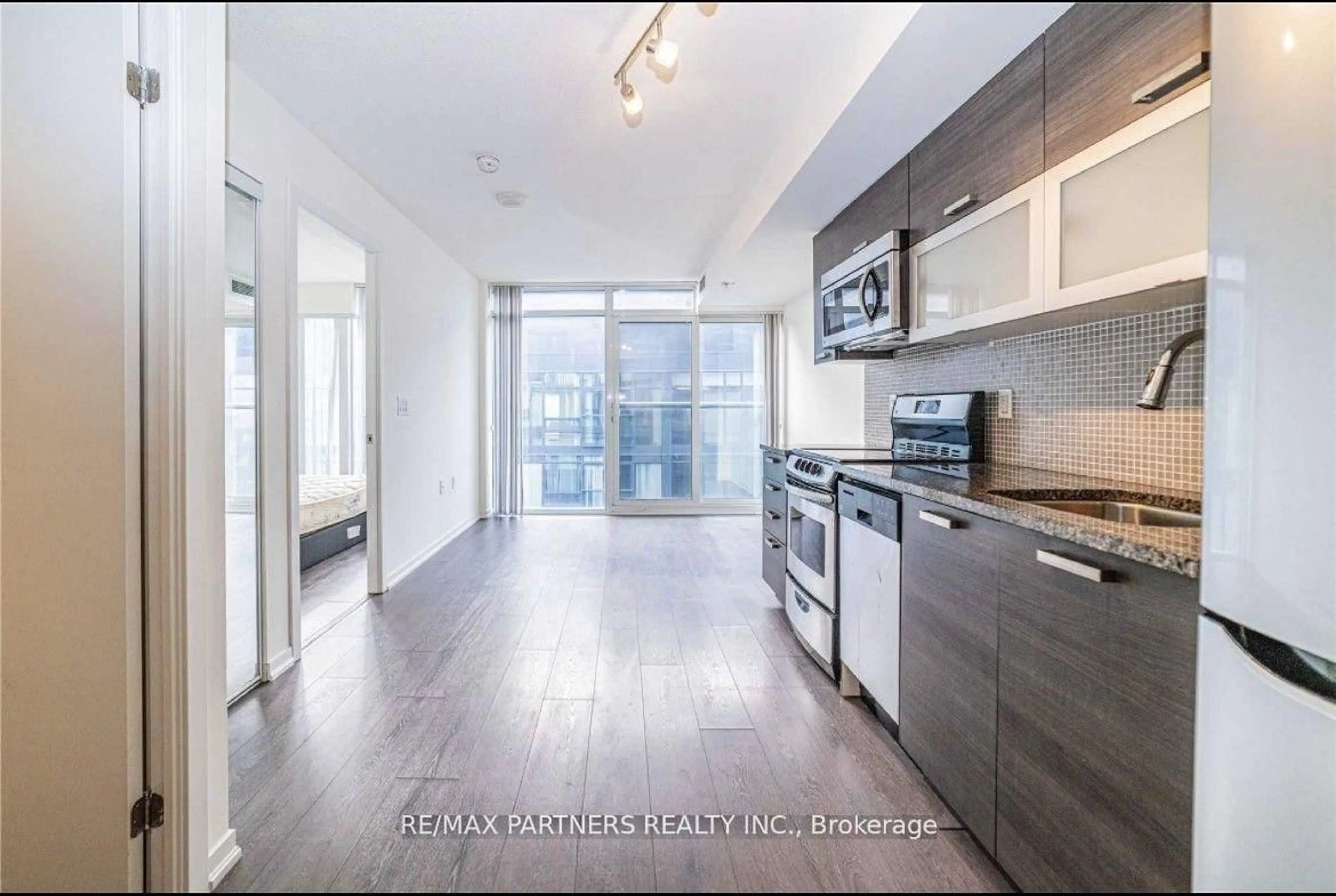 Open concept kitchen, unknown for 36 Lisgar St #2201E, Toronto Ontario M6J 0C7