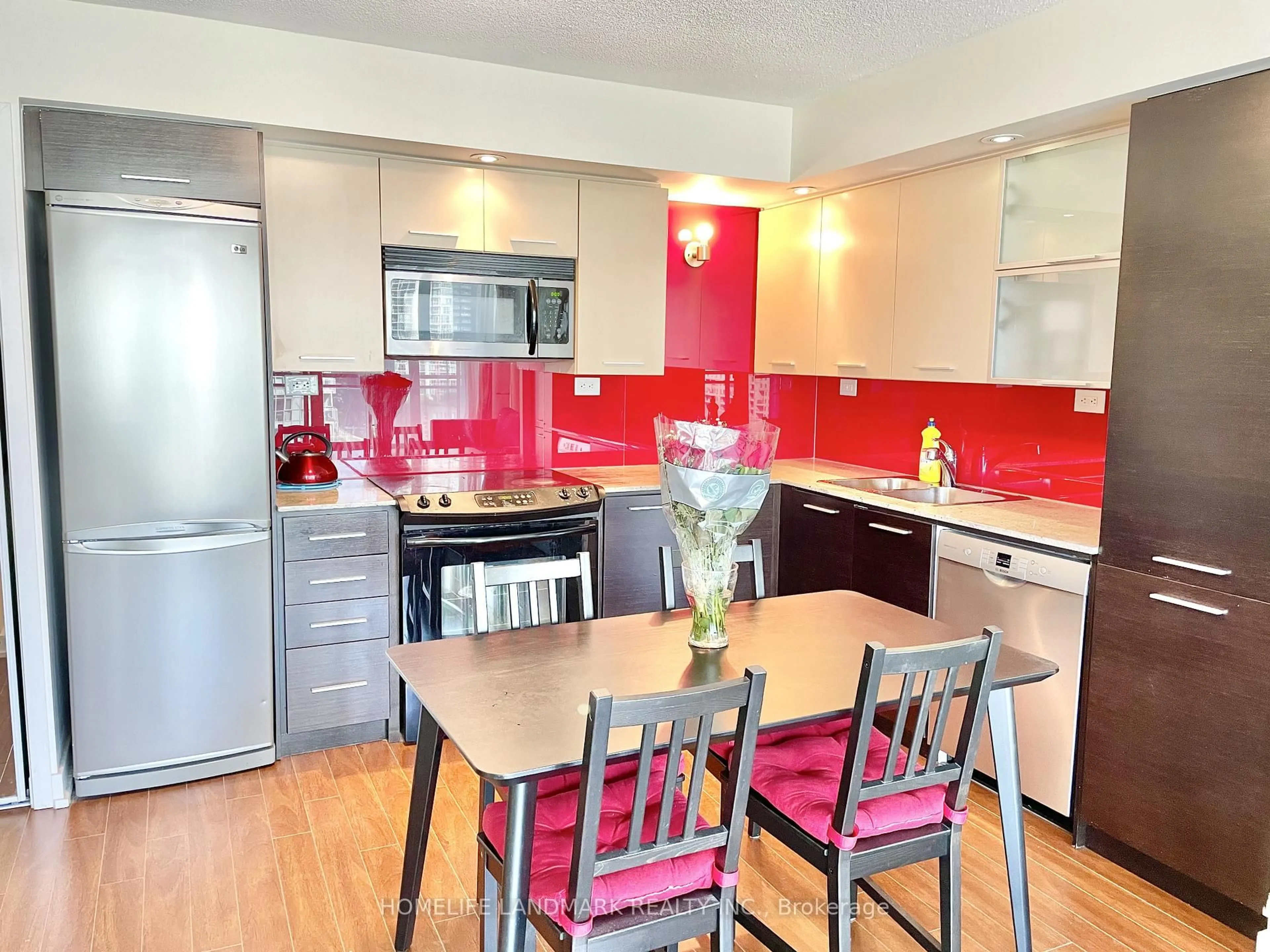 Open concept kitchen, wood/laminate floor for 8 TELEGRAM Mews #1610, Toronto Ontario M5V 3Z5