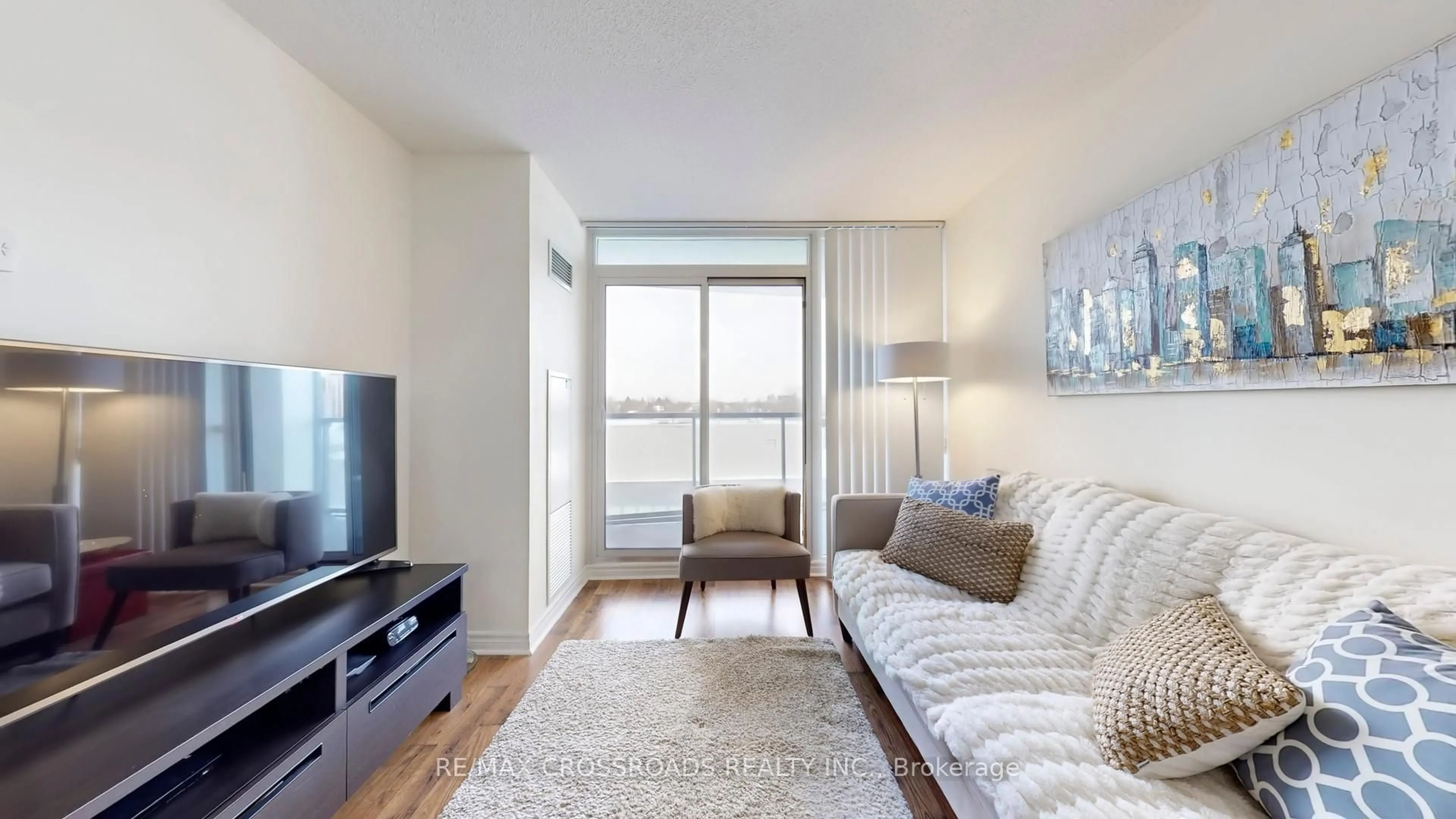 Living room with furniture, wood/laminate floor for 35 Hollywood Ave #702, Toronto Ontario M2N 0A9