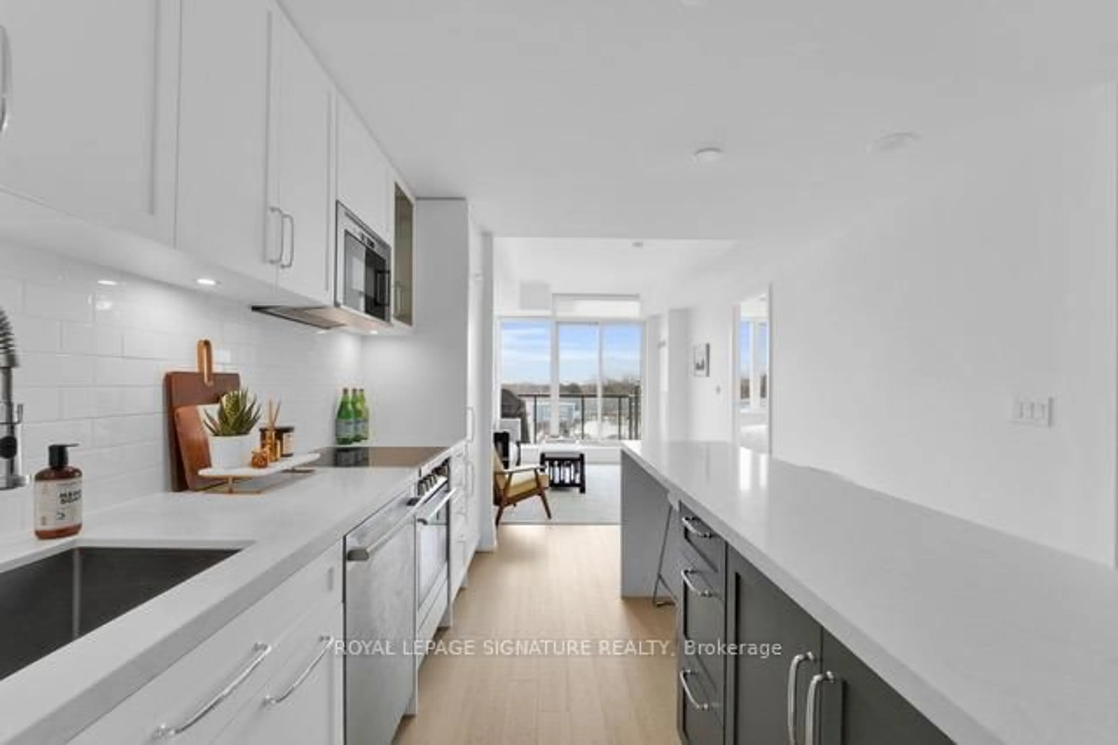 Open concept kitchen, ceramic/tile floor for 25 Malcolm Rd #408, Toronto Ontario M4G 0C1