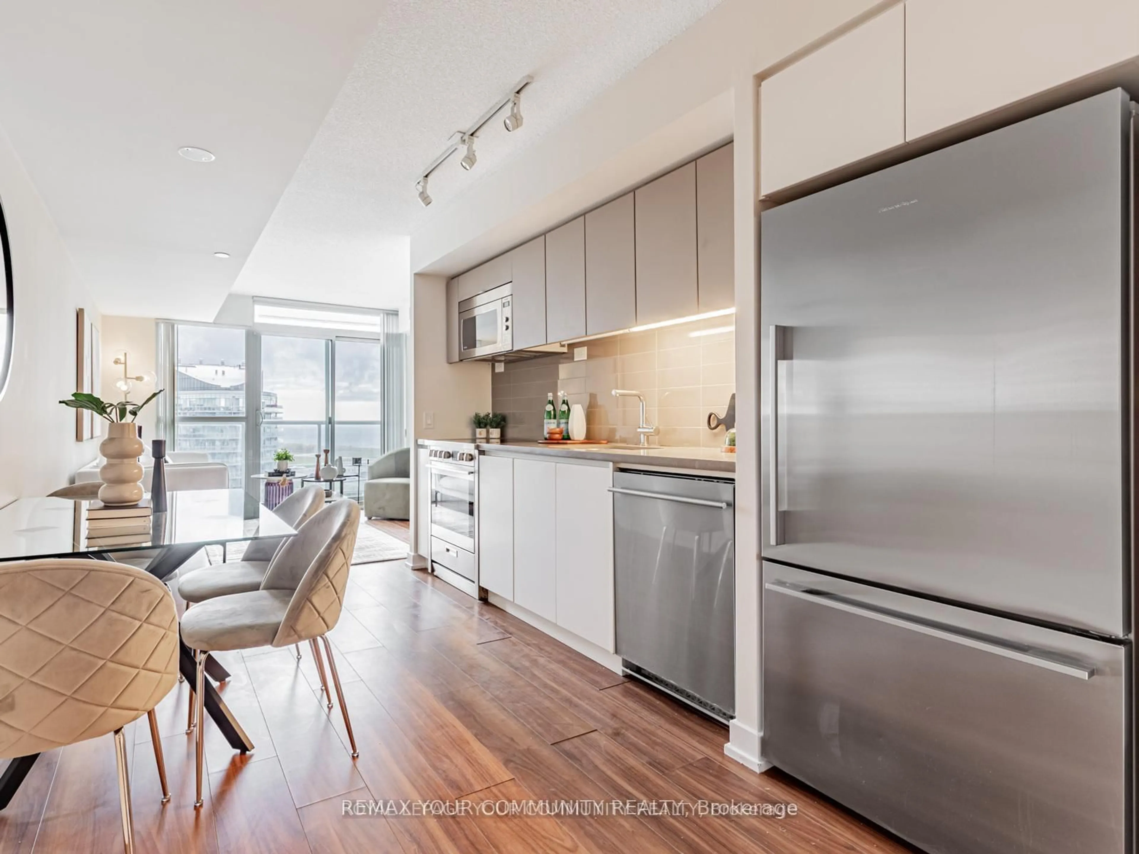 Open concept kitchen, wood/laminate floor for 85 Queens Wharf Rd #3002, Toronto Ontario M5V 0J9