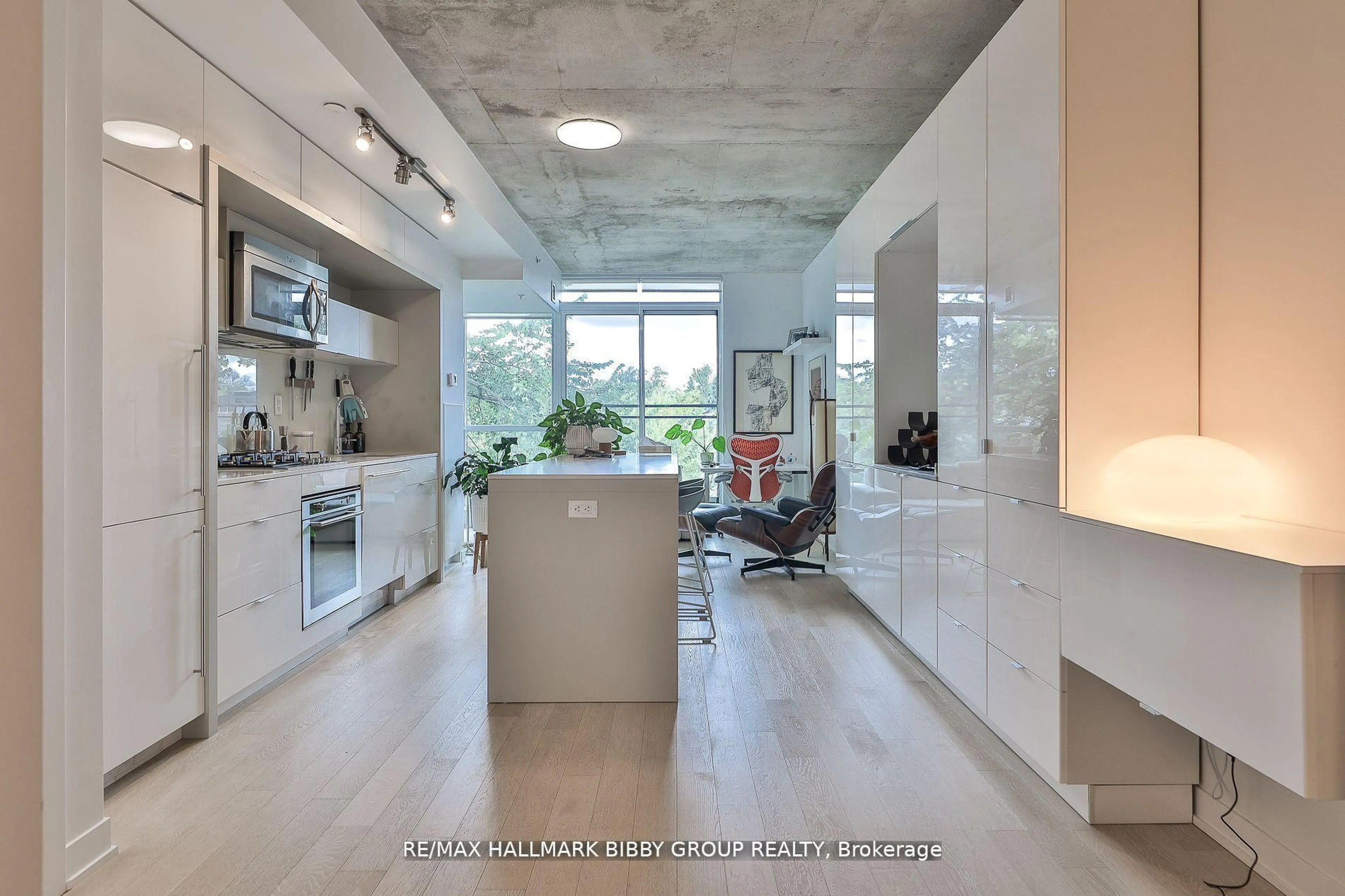 Open concept kitchen, ceramic/tile floor for 130 Rusholme Rd #309, Toronto Ontario M6H 1A7