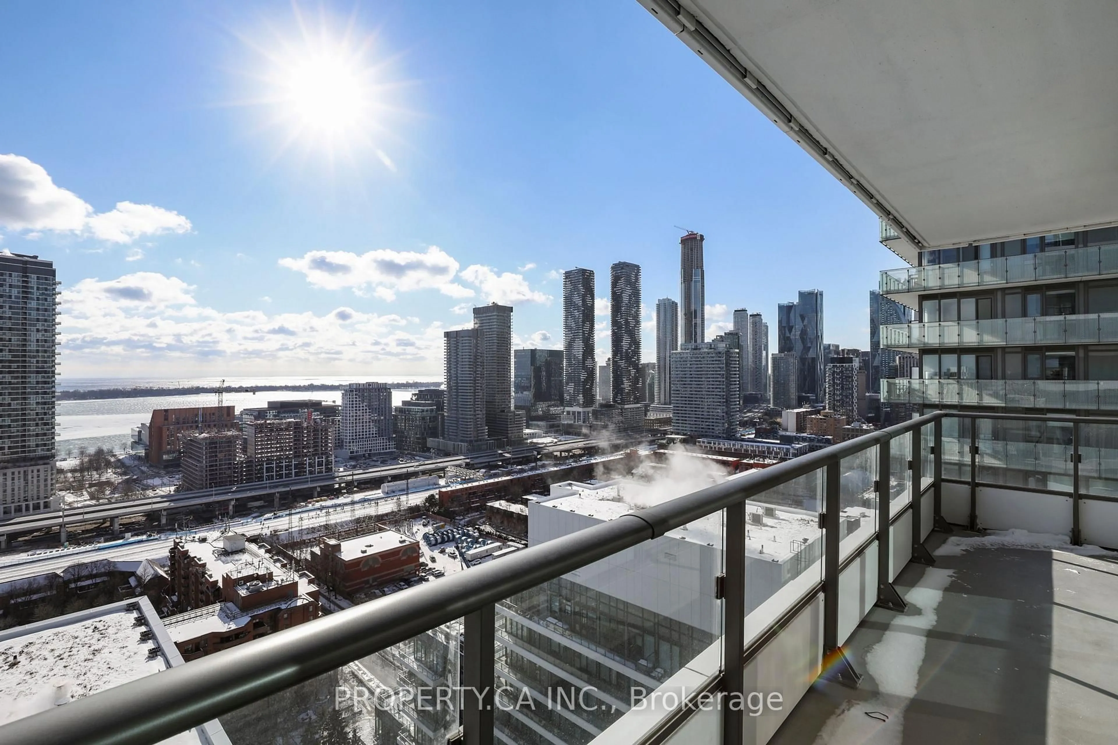 Balcony in the apartment, city buildings view from balcony for 70 Princess St, Toronto Ontario M5A 0X6