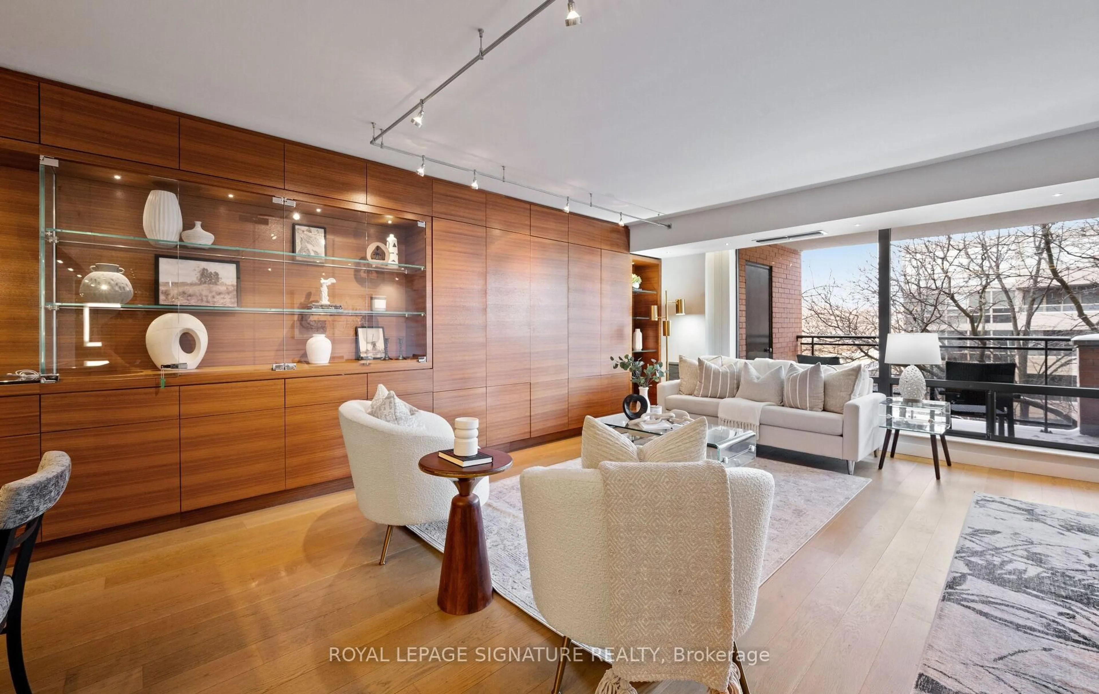 Living room with furniture, wood/laminate floor for 260 Heath St #409, Toronto Ontario M5P 3L6