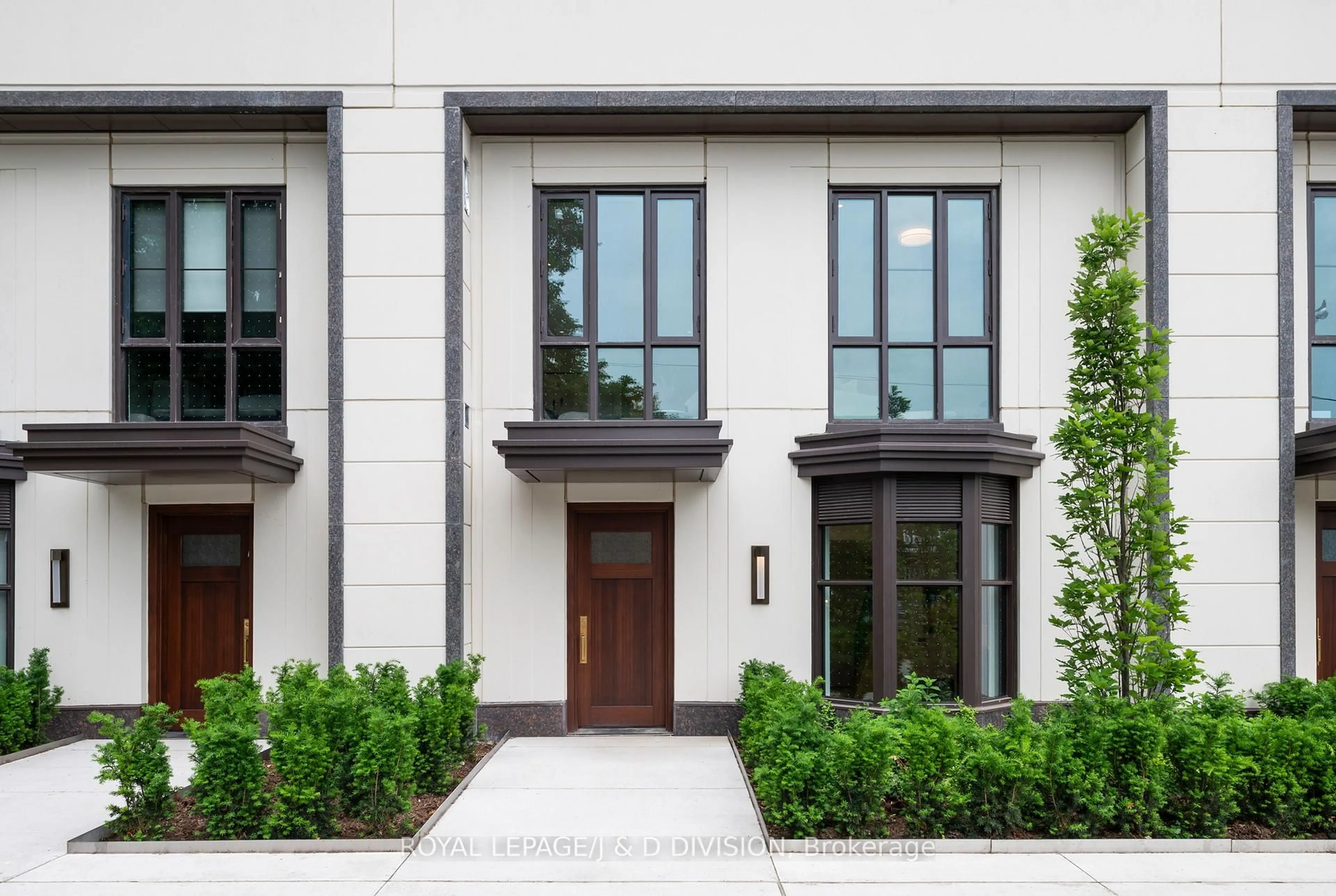 Home with brick exterior material, street for 1 Strathgowan Ave #TH2, Toronto Ontario M4N 0B3