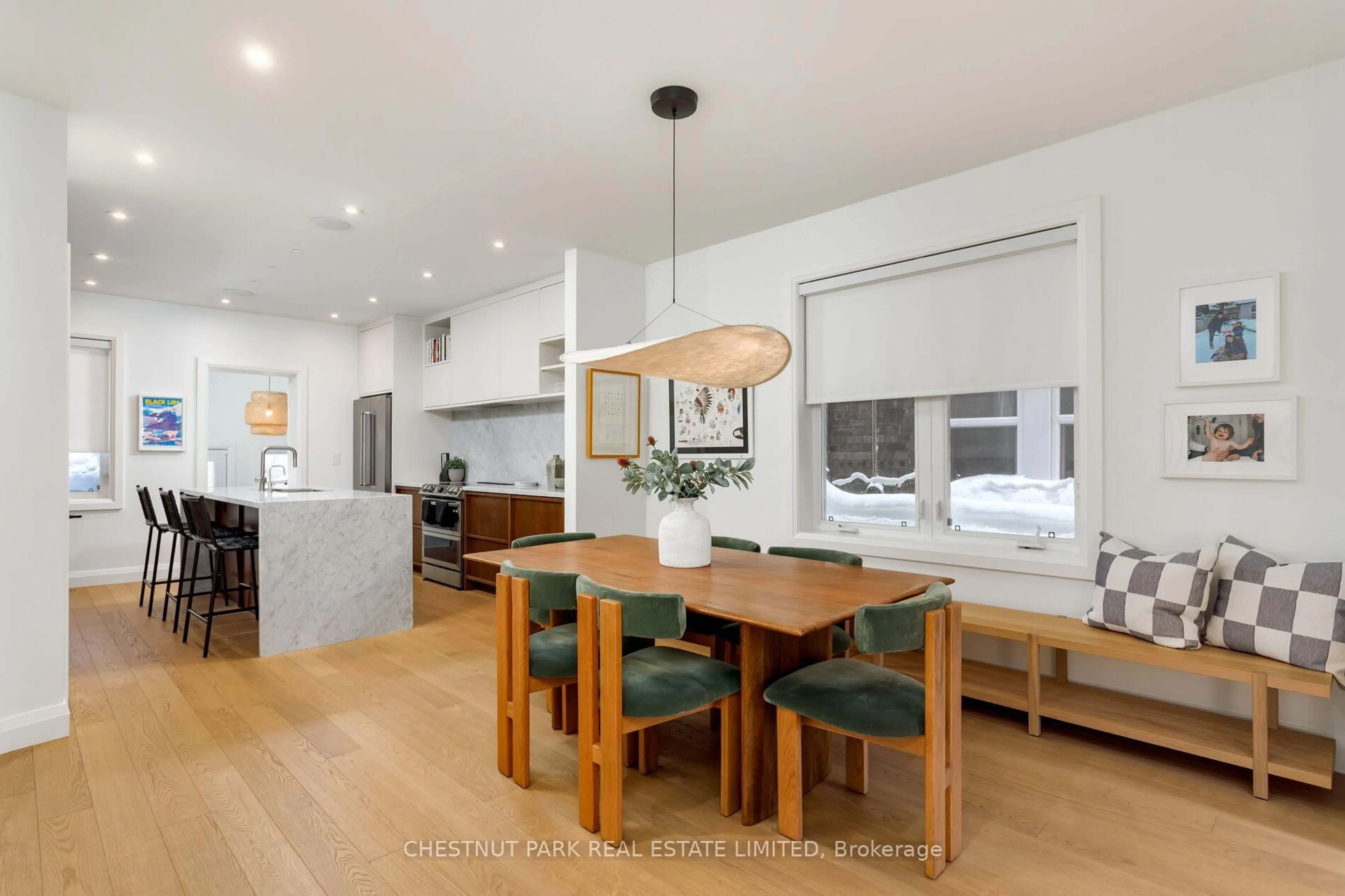 Open concept kitchen, wood/laminate floor for 232 Ashworth Ave, Toronto Ontario M6G 2A7